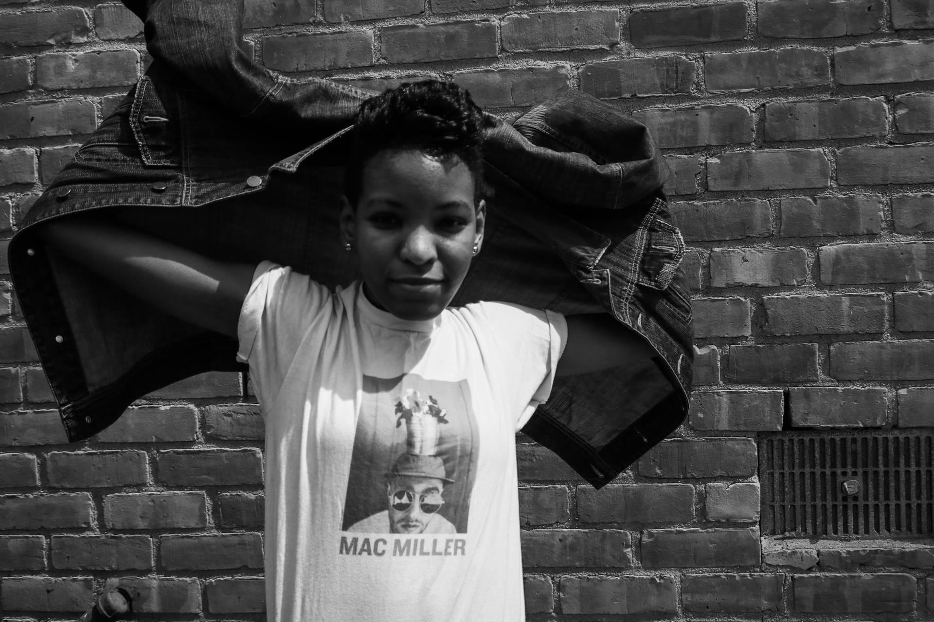 Grayscale Photo Of Girl In Mac Miller Shirt Background