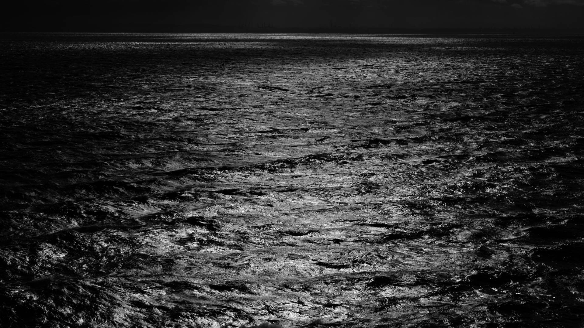 Grayscale Sea Under Moonlight 4k Background