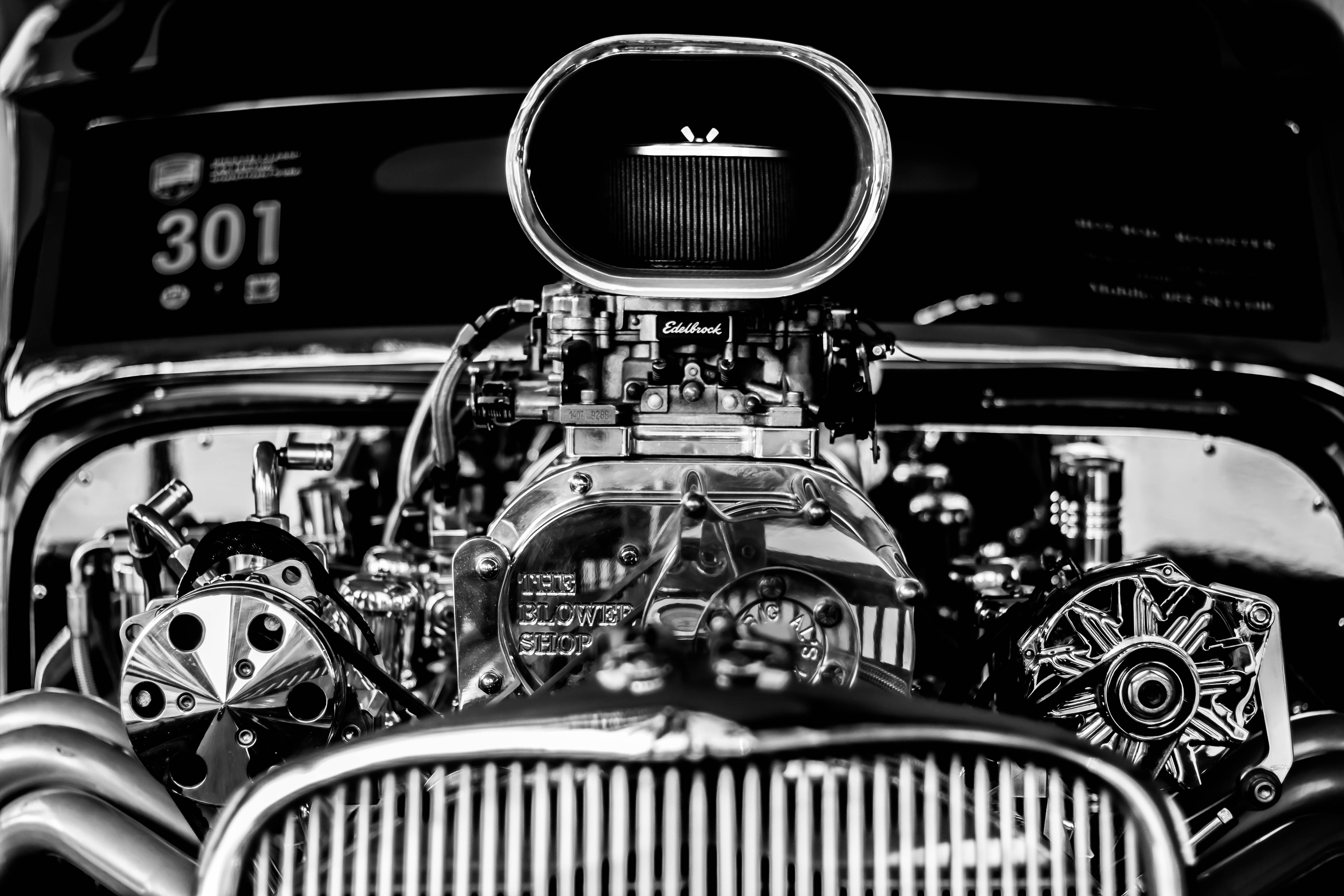 Grayscale Vintage Car Engine Background