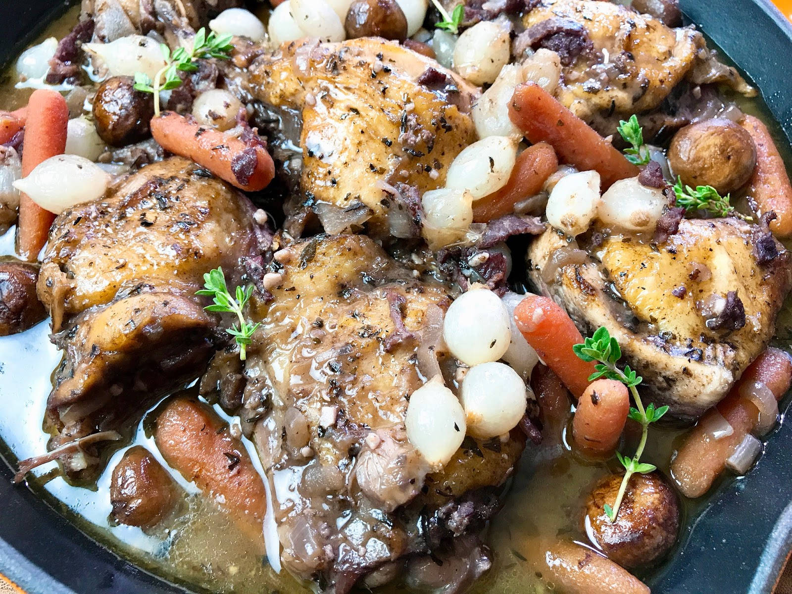 Greasy Coq Au Vin On A Pan Background