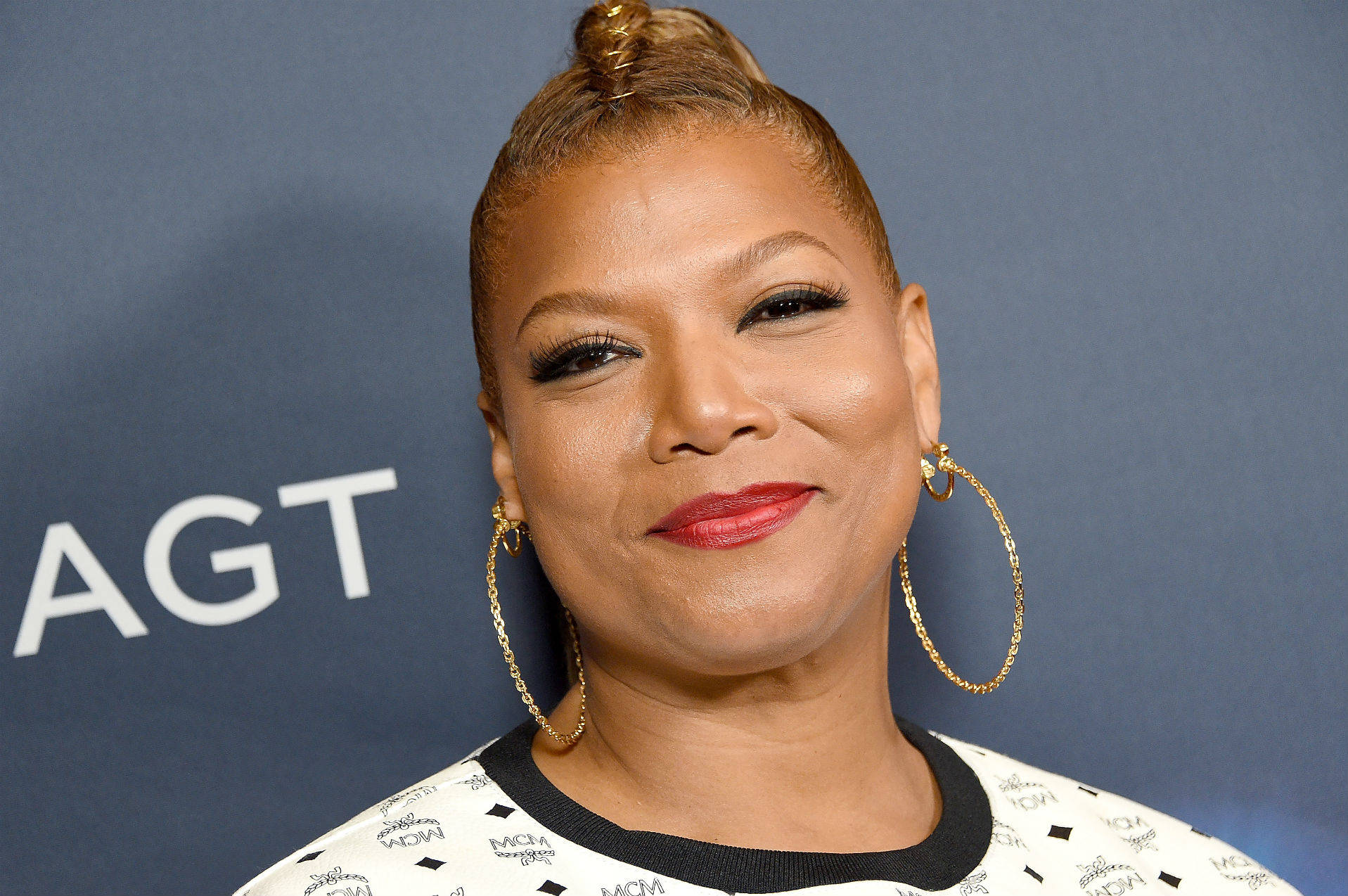 Great American Rapper Queen Latifah Background