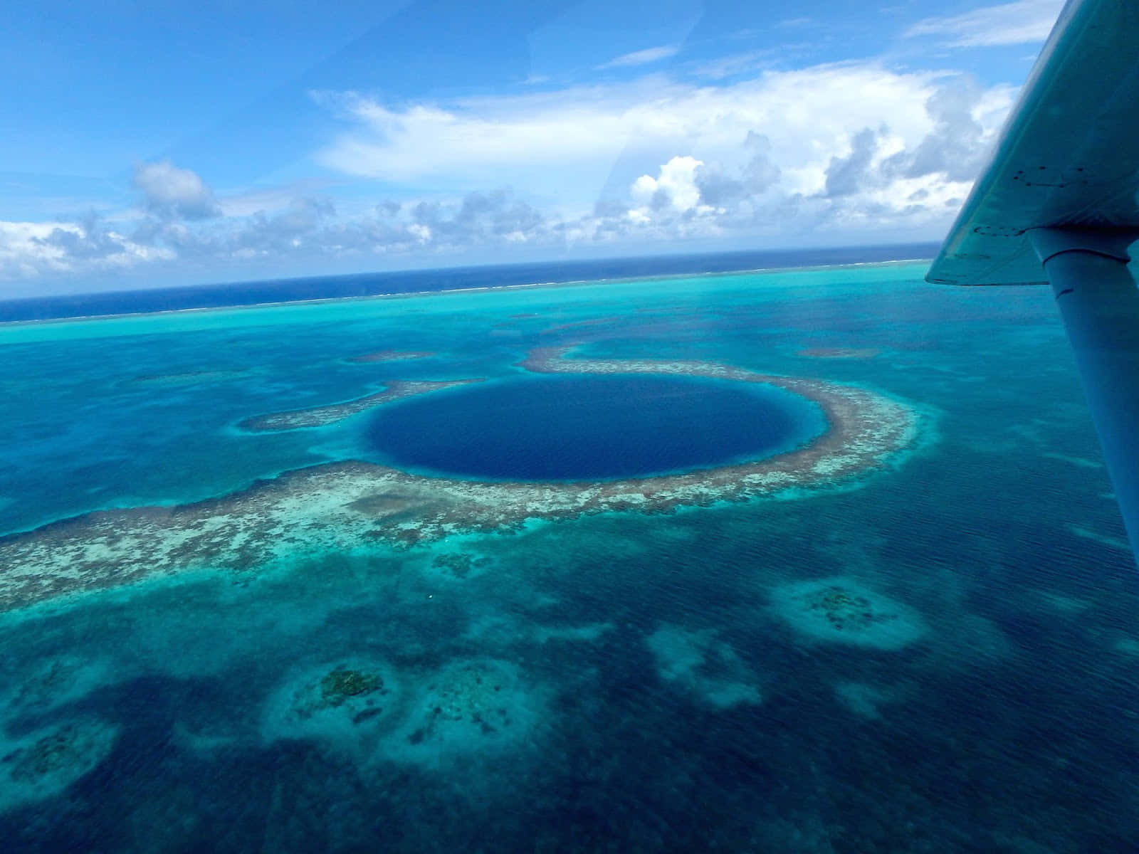 Great Blue Hole And Blue Sky Background