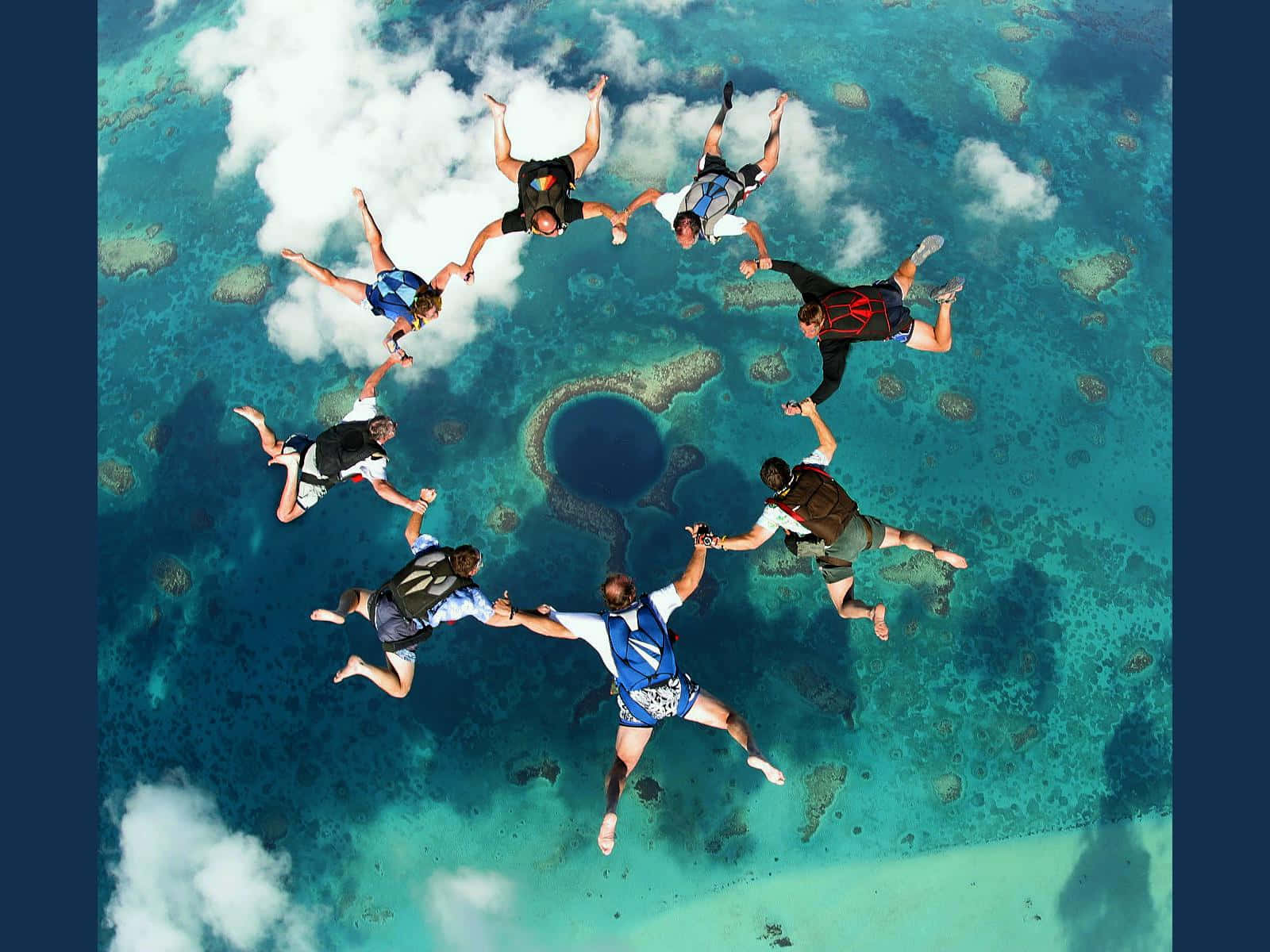 Great Blue Hole With Skydivers Background