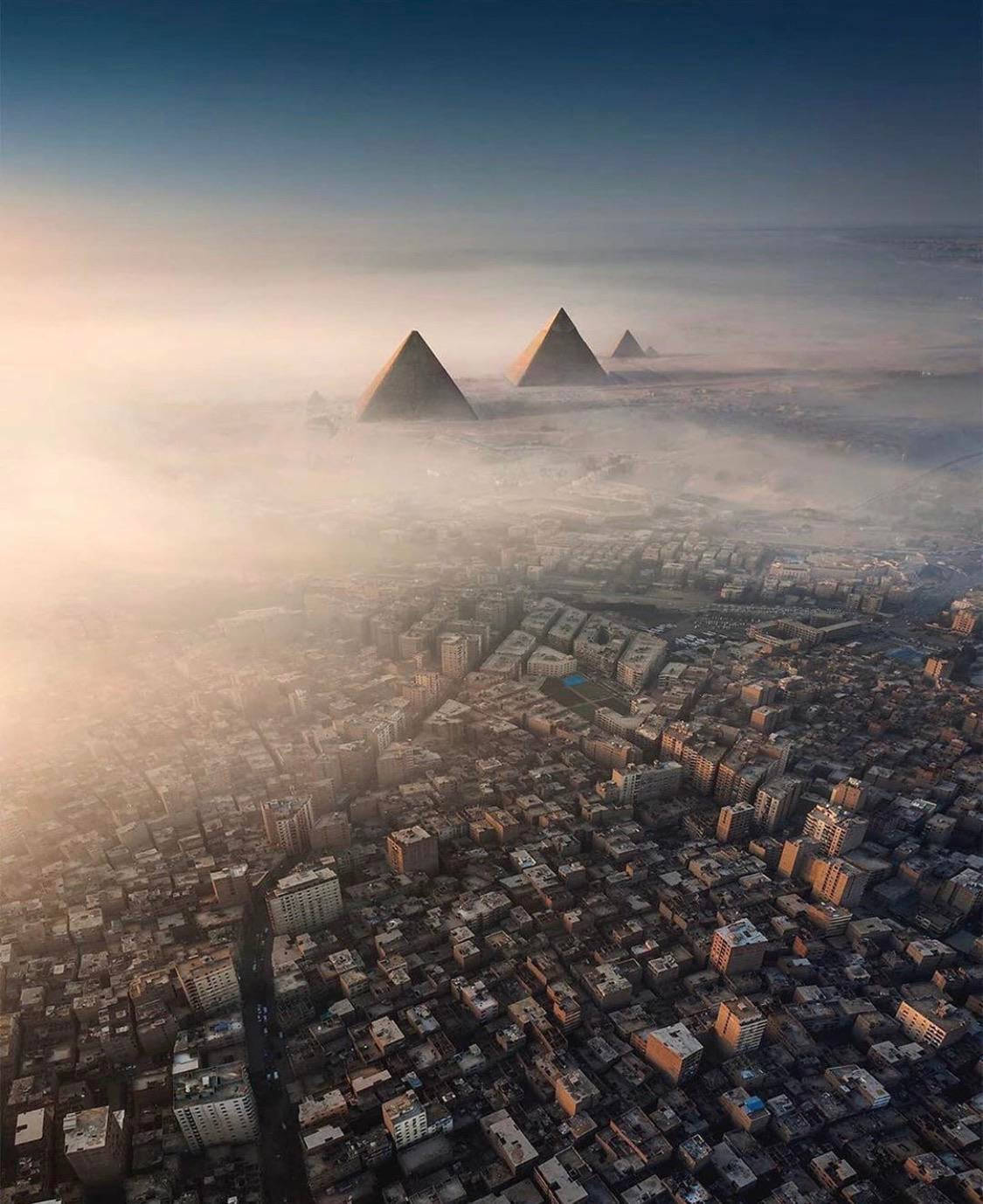 Greater Cairo's Pyramid Skyline Background