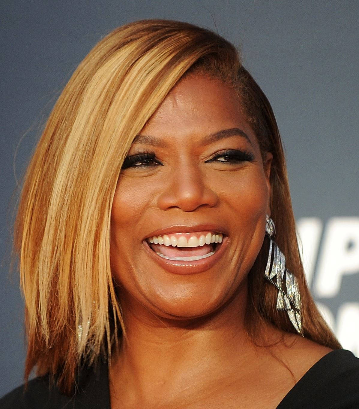 Greatest Artist Queen Latifah Background