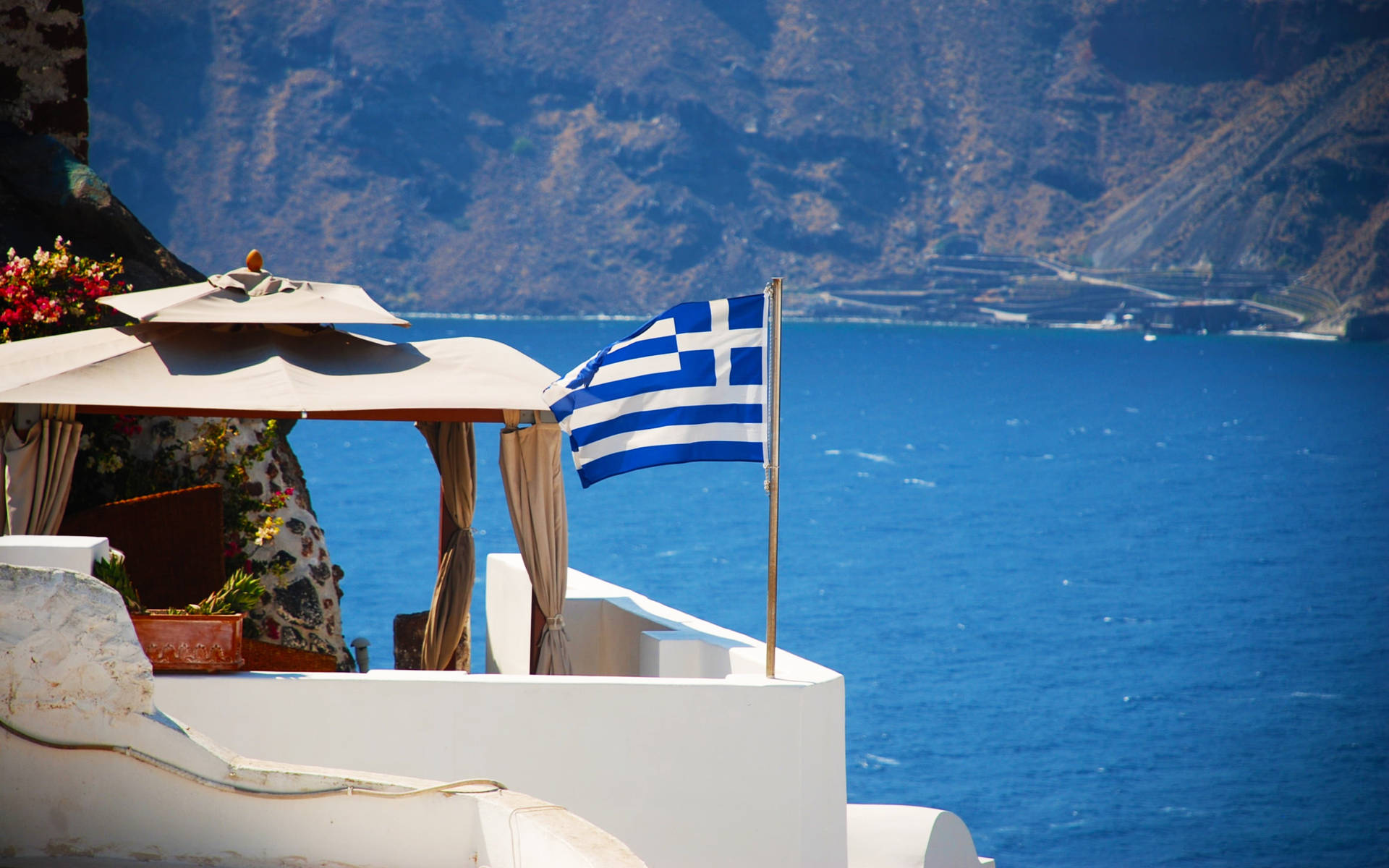 Greek Flag At Tourist Spot Background