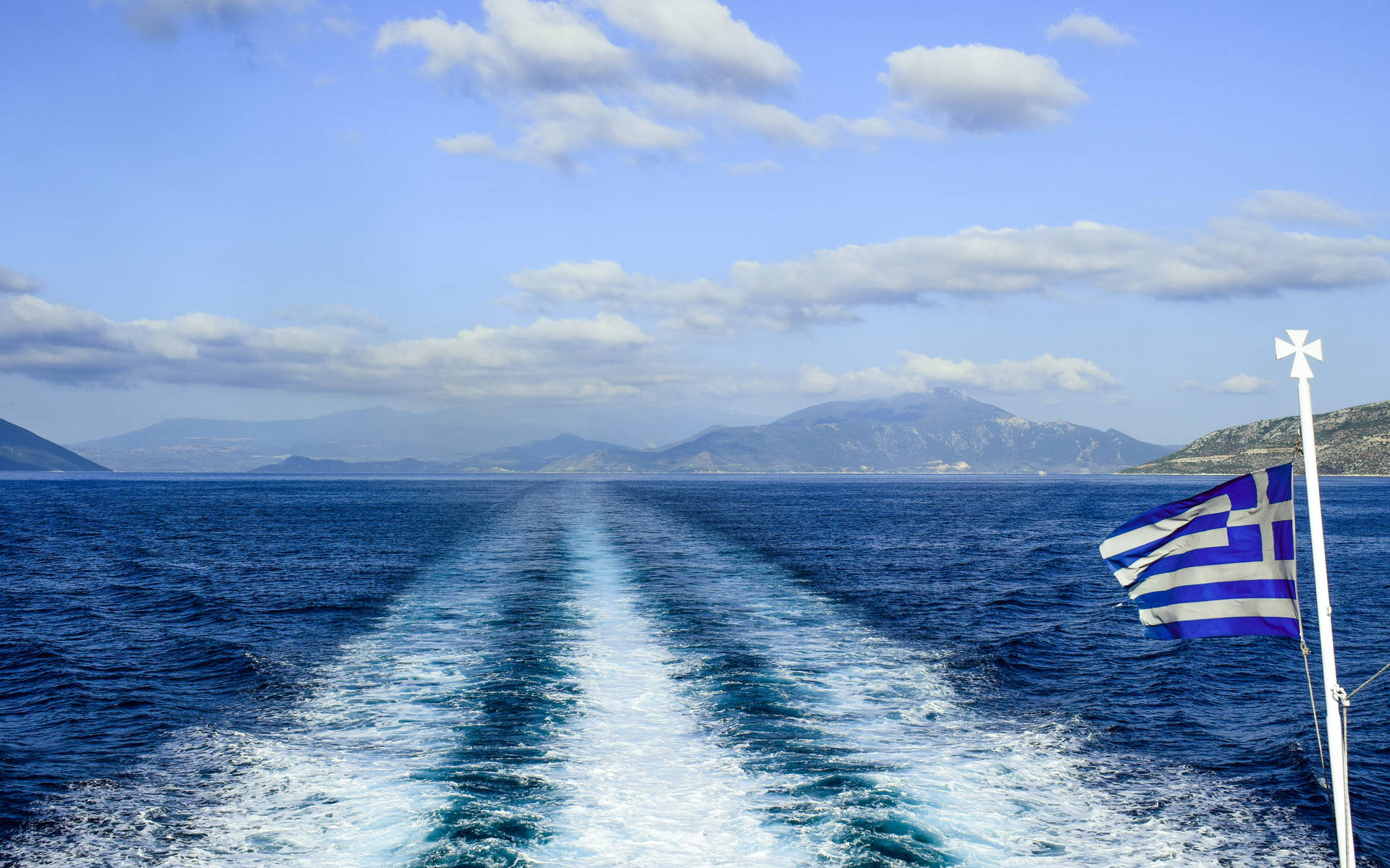 Greek Flag On A Boat Background
