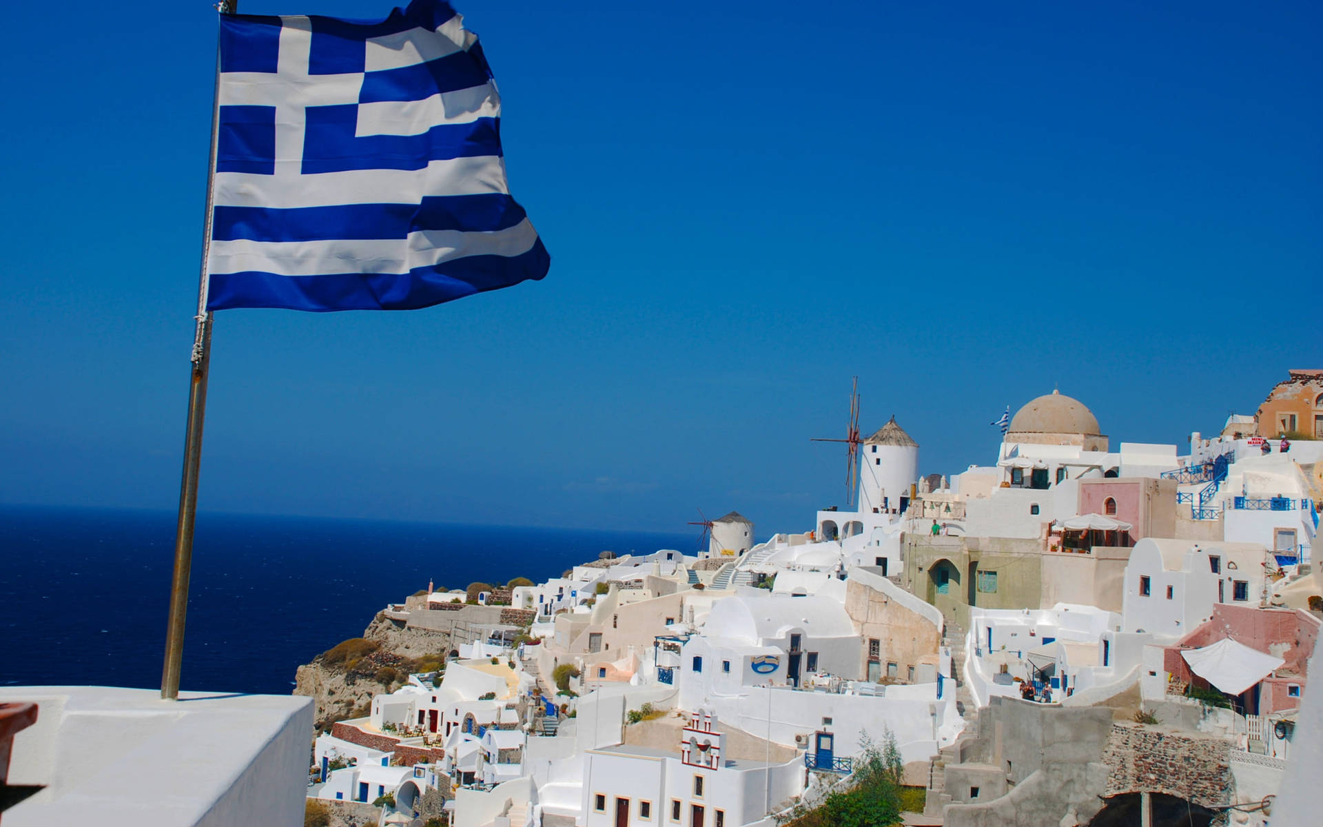 Greek Flag On Santorini Background