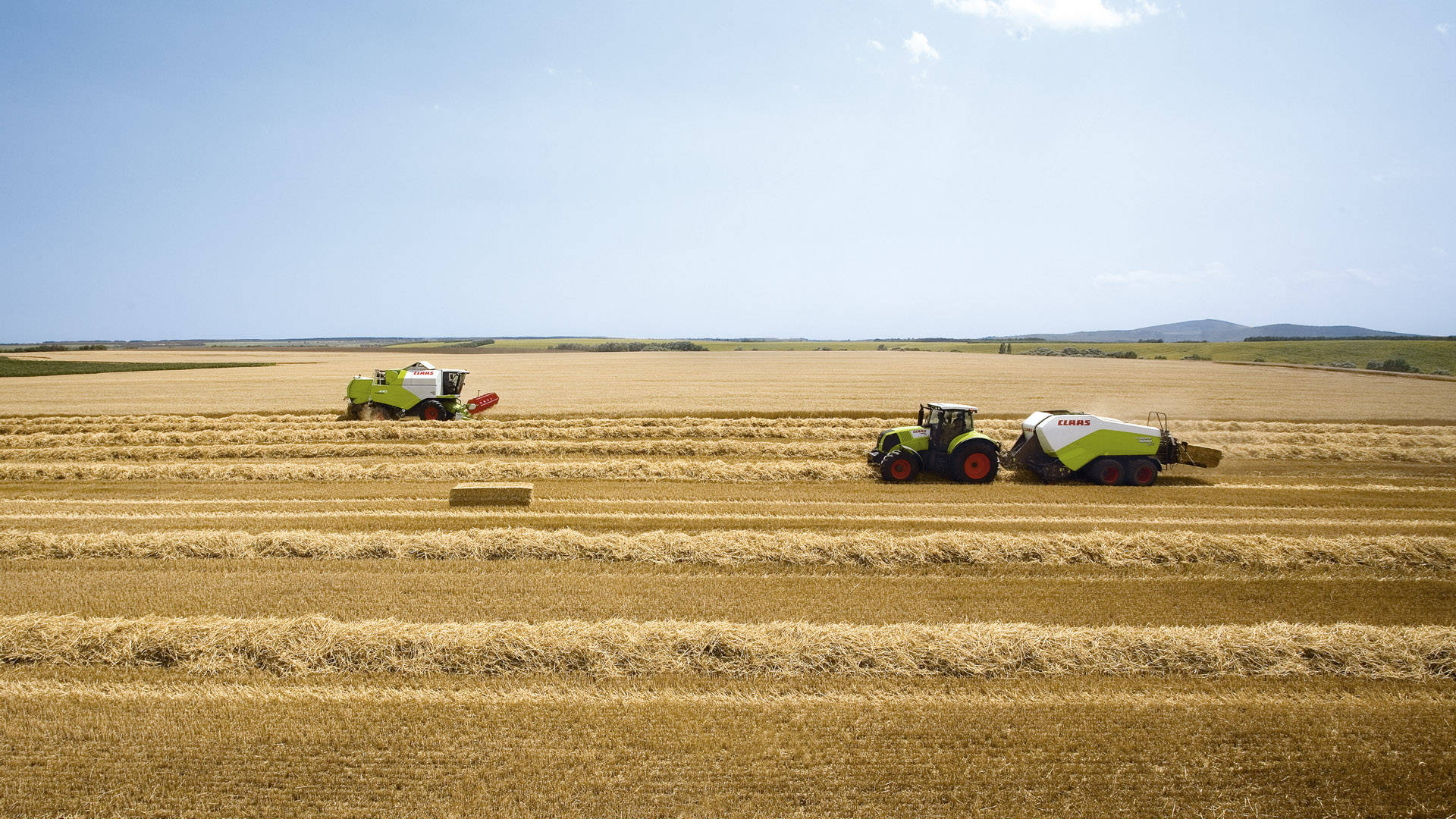 Green And White Claas Tractor Background