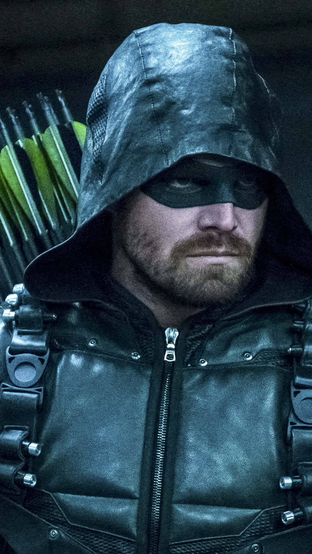 Green Arrow In A Black Outfit With Arrows