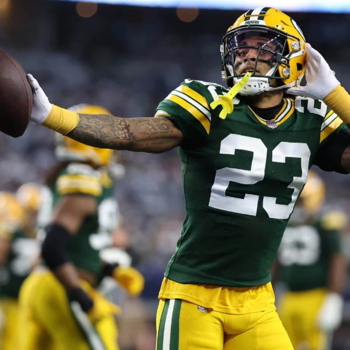 Green Bay Defensive Player In Action Background