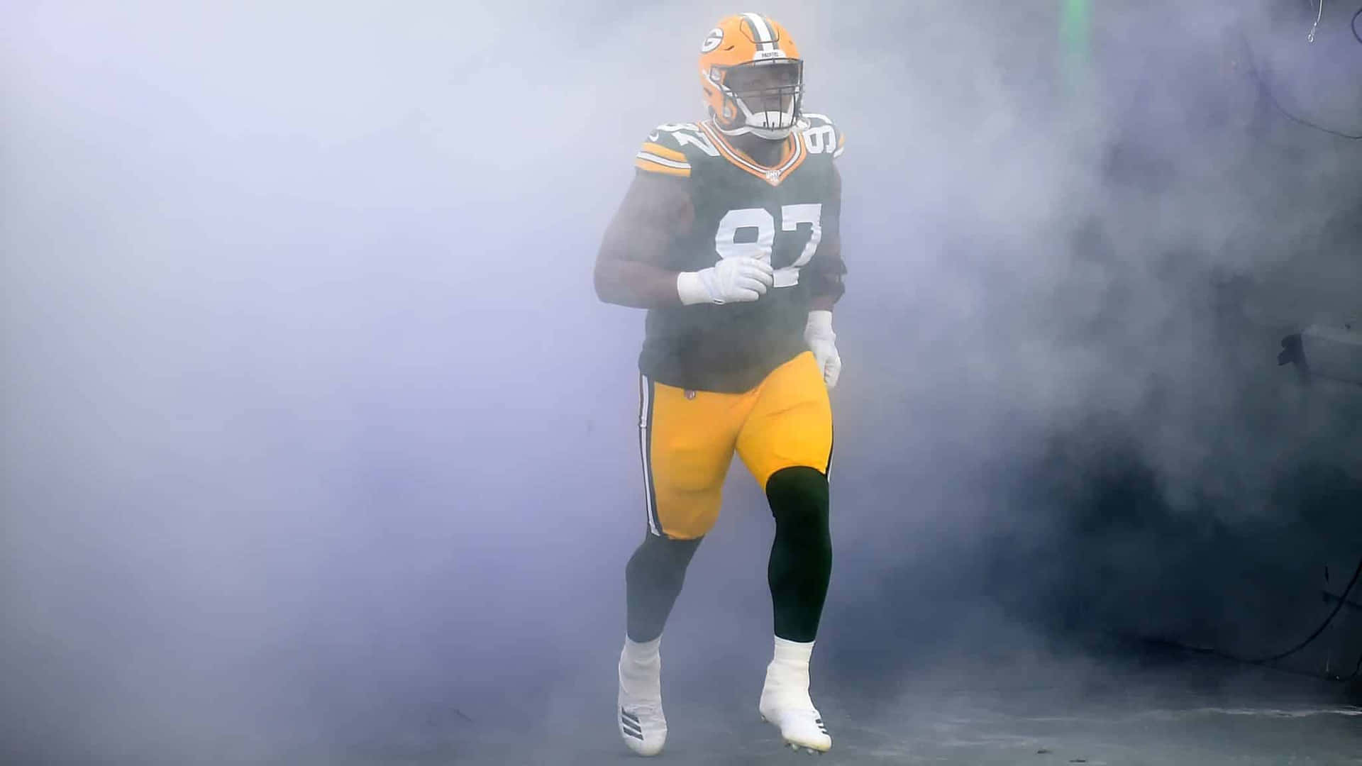 Green Bay Packers Kenny Clark Entrance In Lambeau Field Background