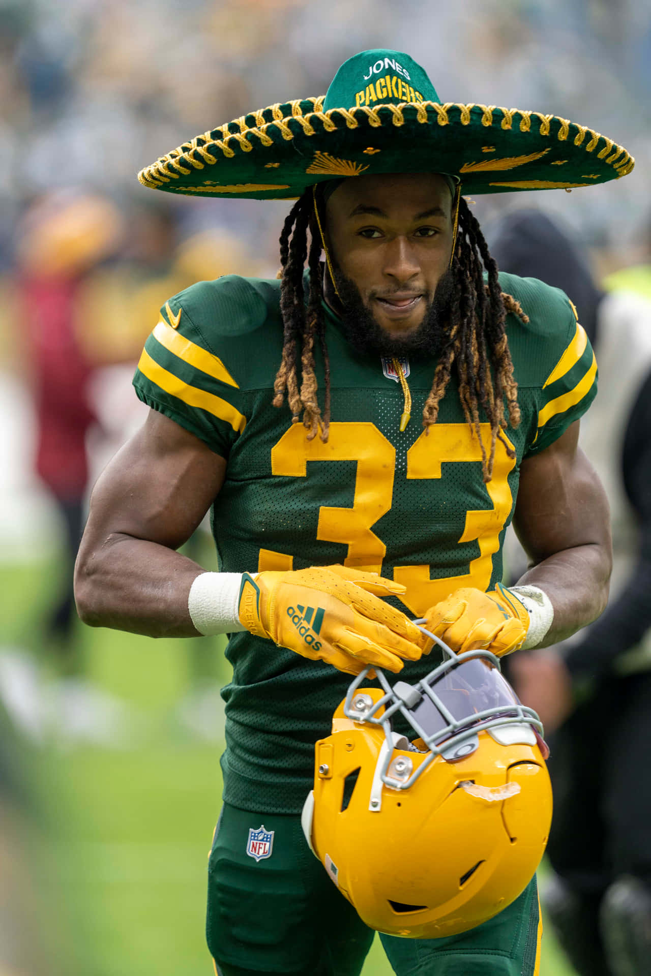 Green Bay Packers Running Back, Aaron Jones Background