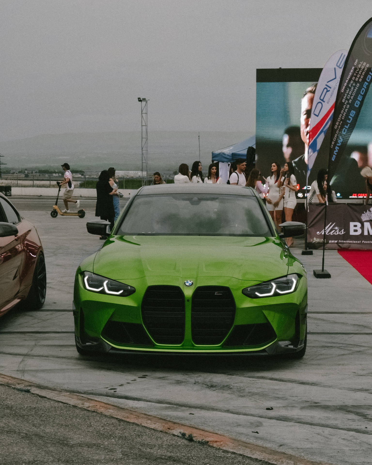 Green Bmw G80 At Racing Track Background