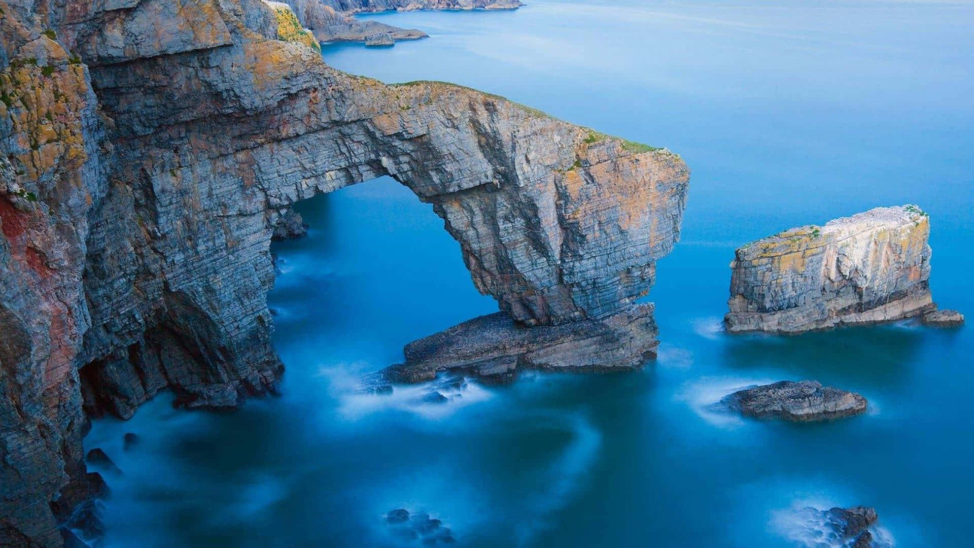 Green Bridge Of Wales Limestone Arch Cliff