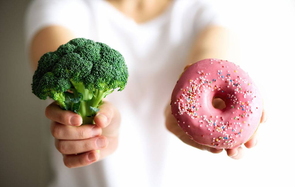 Green Broccoli And Pink Donut Background