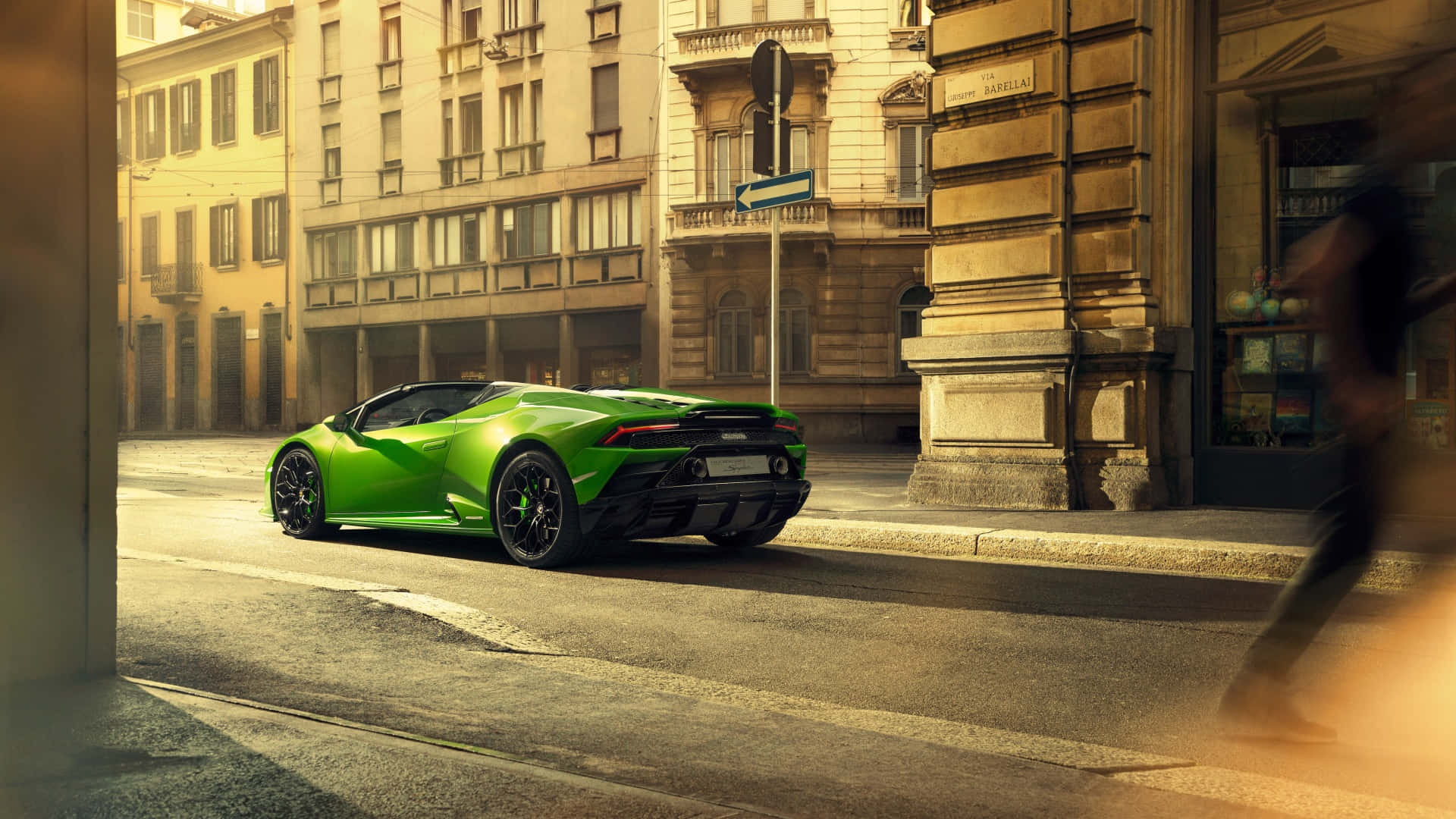 Green Car And Brown City Buildings