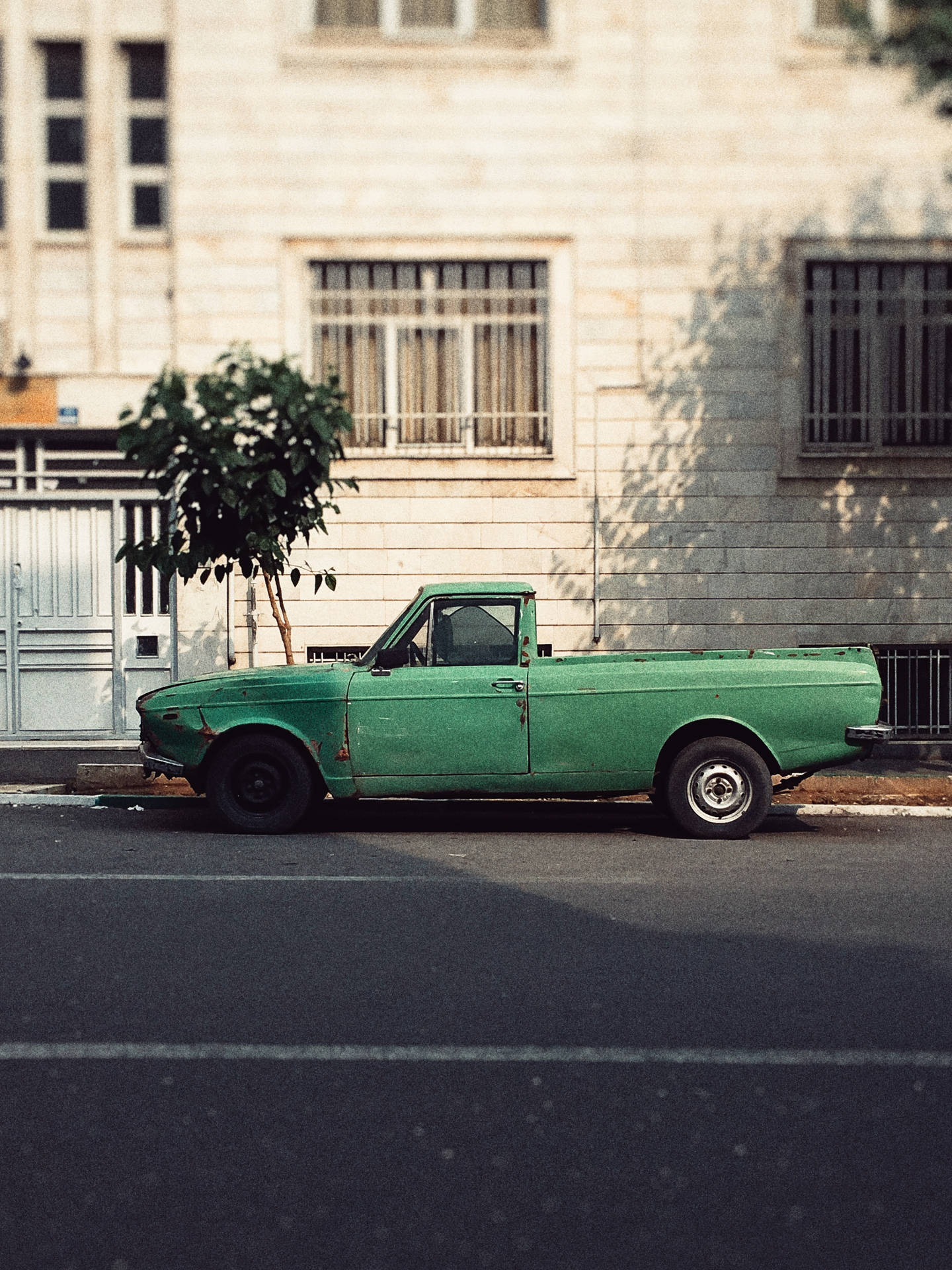 Green Car In The Street Background
