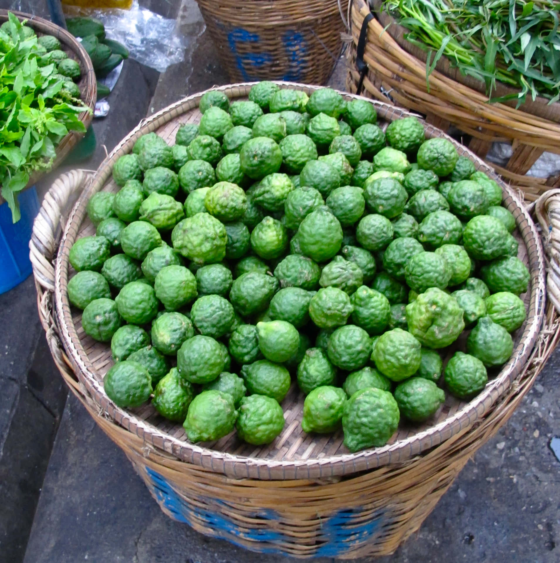 Green Citrus Kaffir Lime On The Basket Background