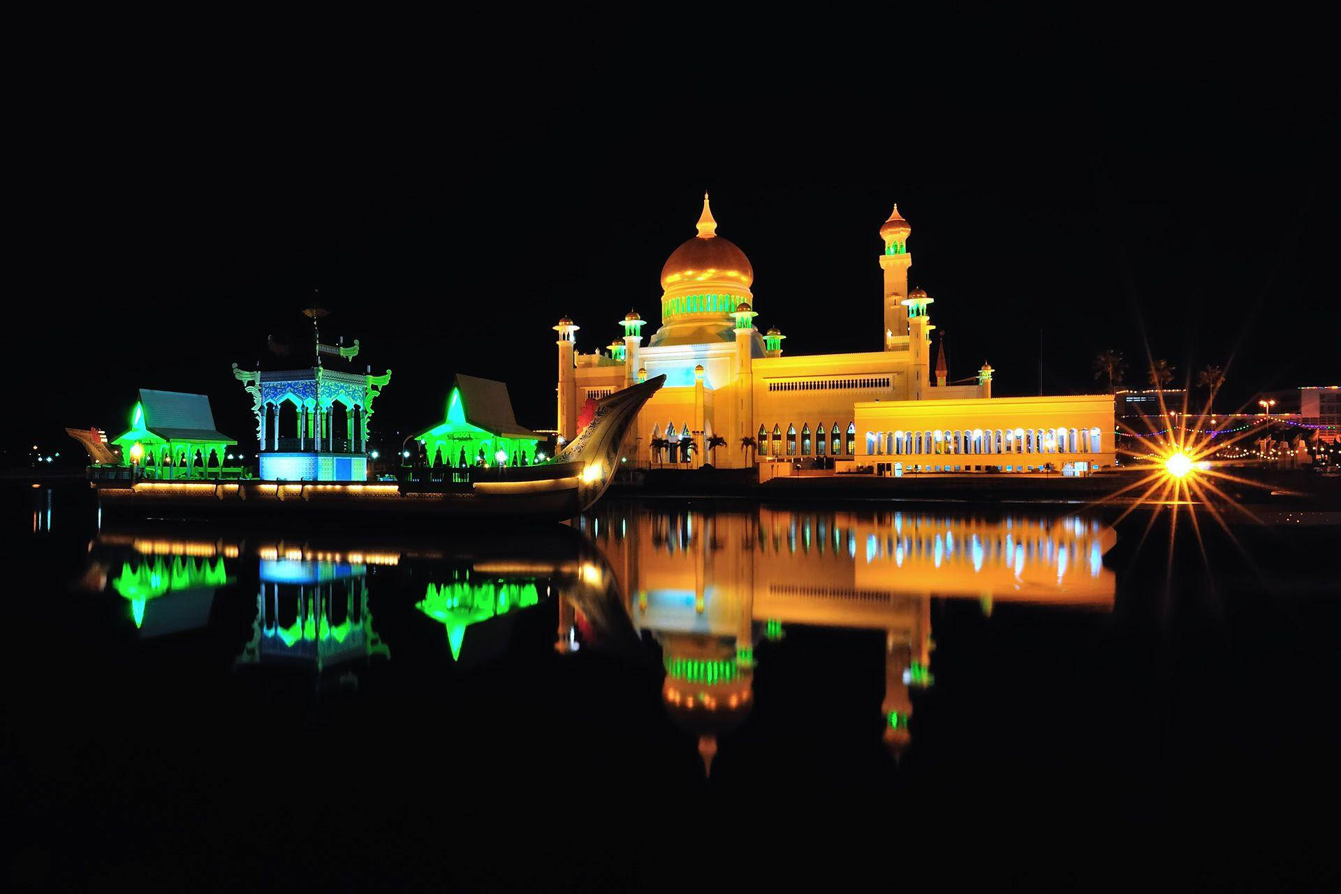 Green Glow Of Brunei Mosque Background