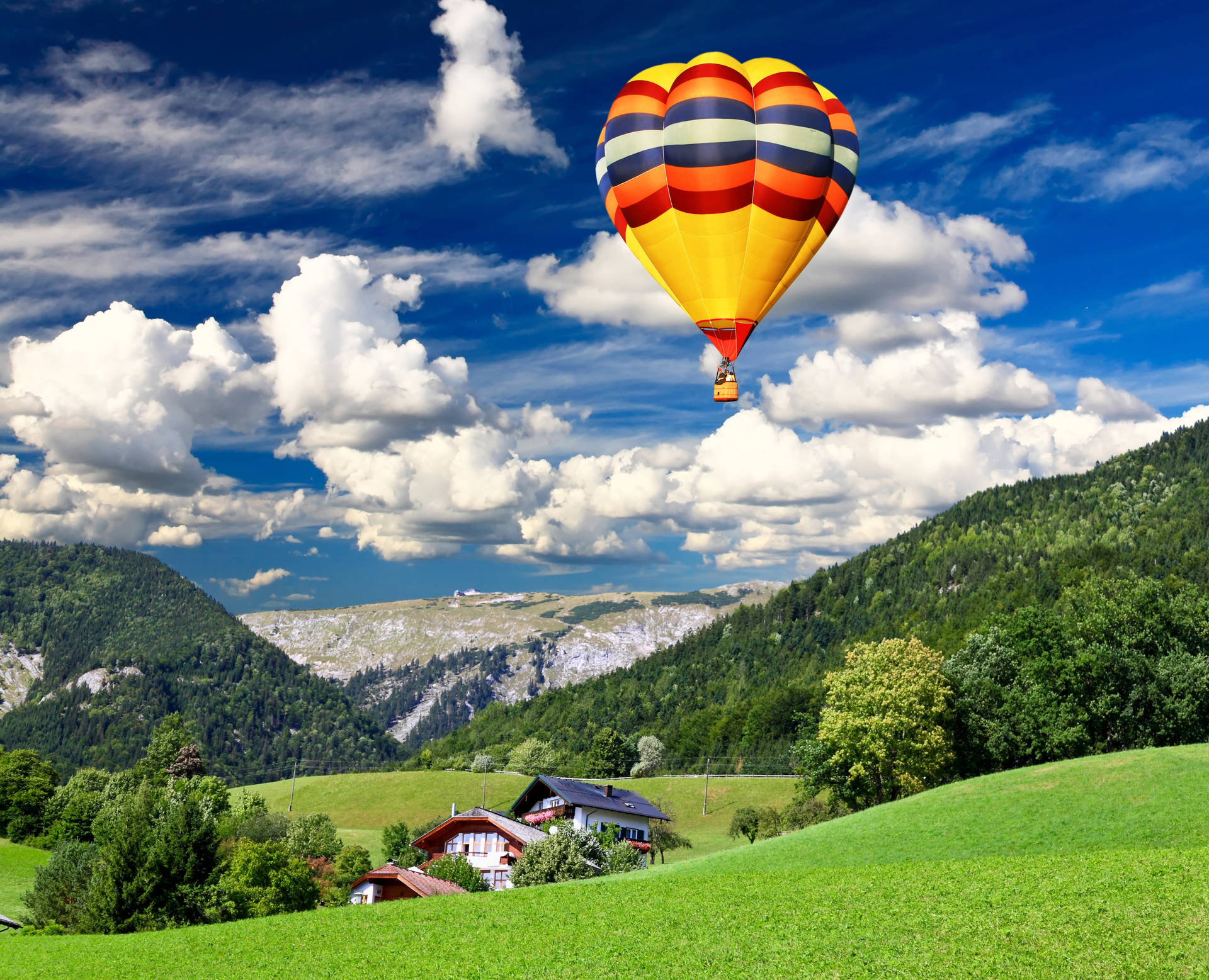 Green Hill And Hot Air Balloon Background