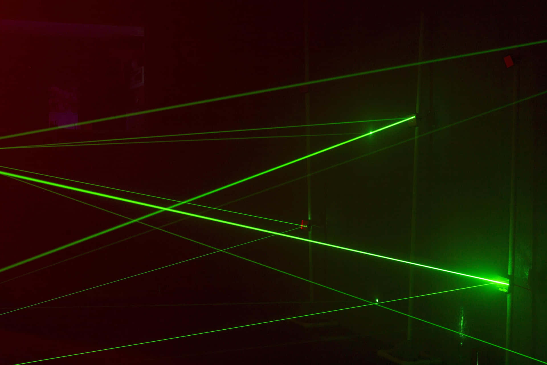 Green Laser Beamsin Dark Room Background
