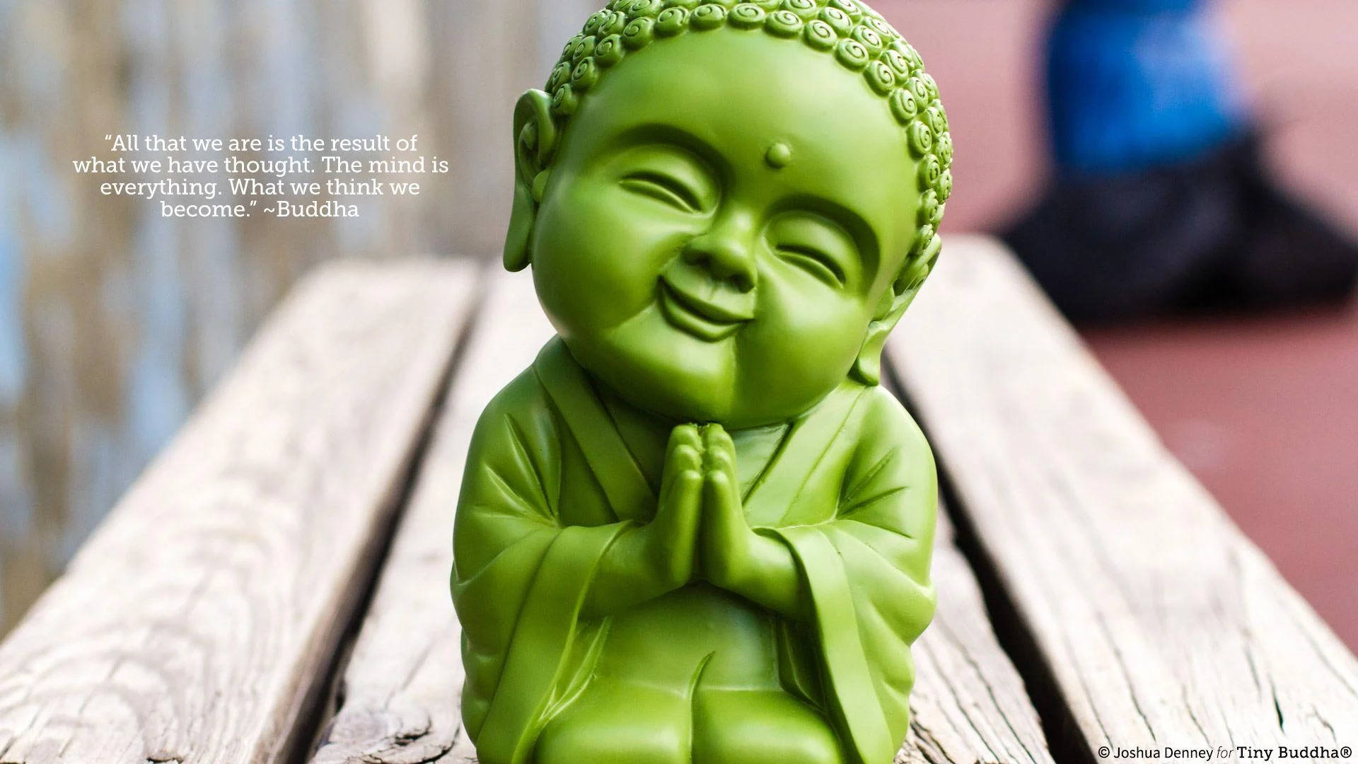 Green Laughing Buddha Figurine Background