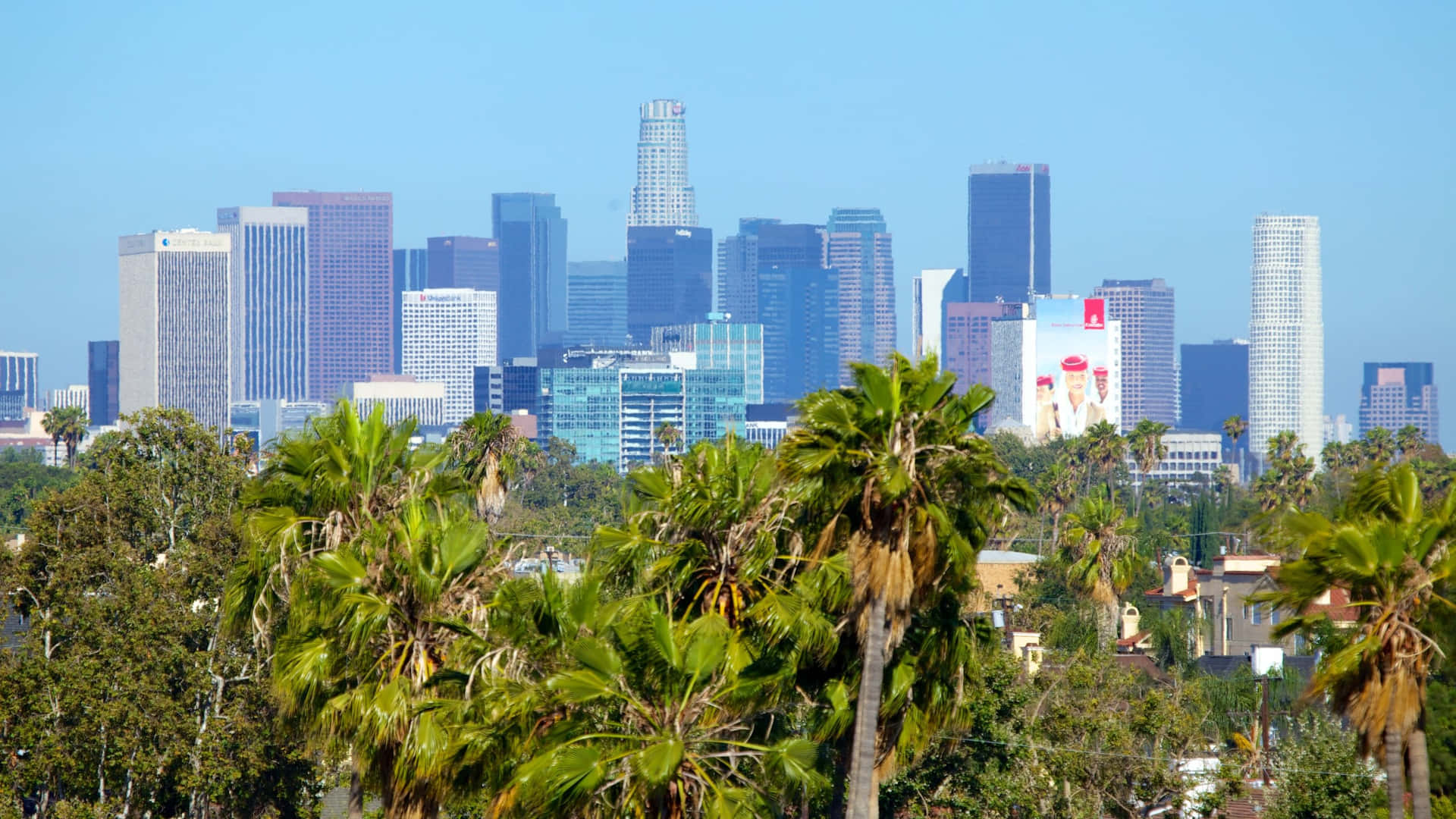 Green Palm Trees Of Los Angeles Skyline Background