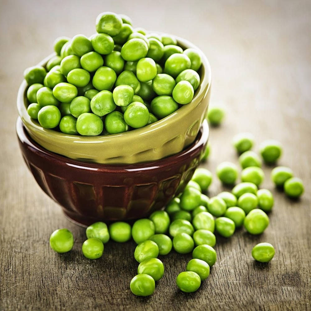 Green Peas In A Stacked Bowl Background