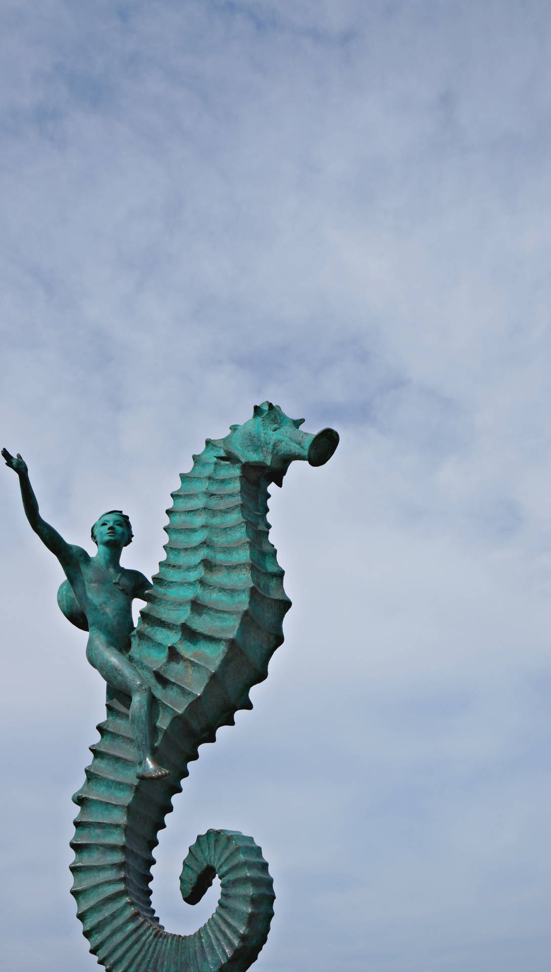 Green Seahorse Monument Background