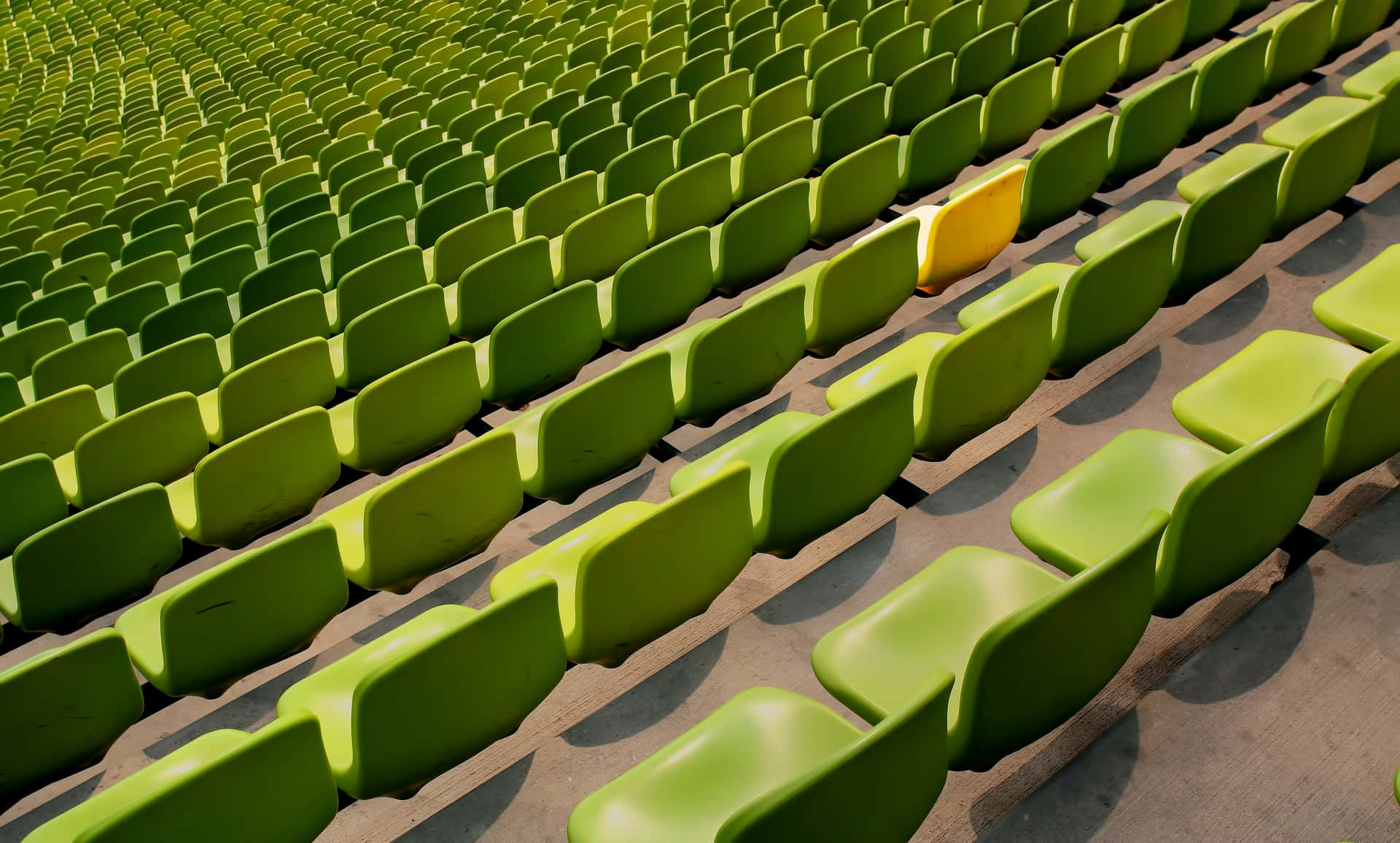 Green Seats With A Yellow Conspicuous Chair