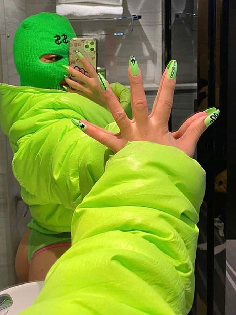 Green Ski Mask Girl In Green Jacket Background