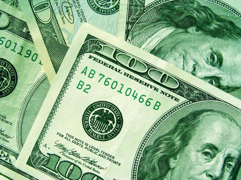 Green-toned 100 Dollar Bill Notes Background