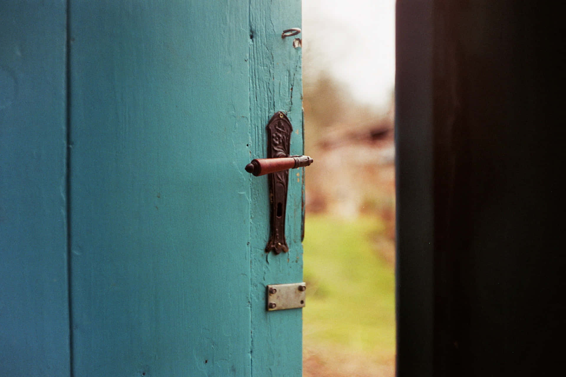 Greenish Open Door Handle Background