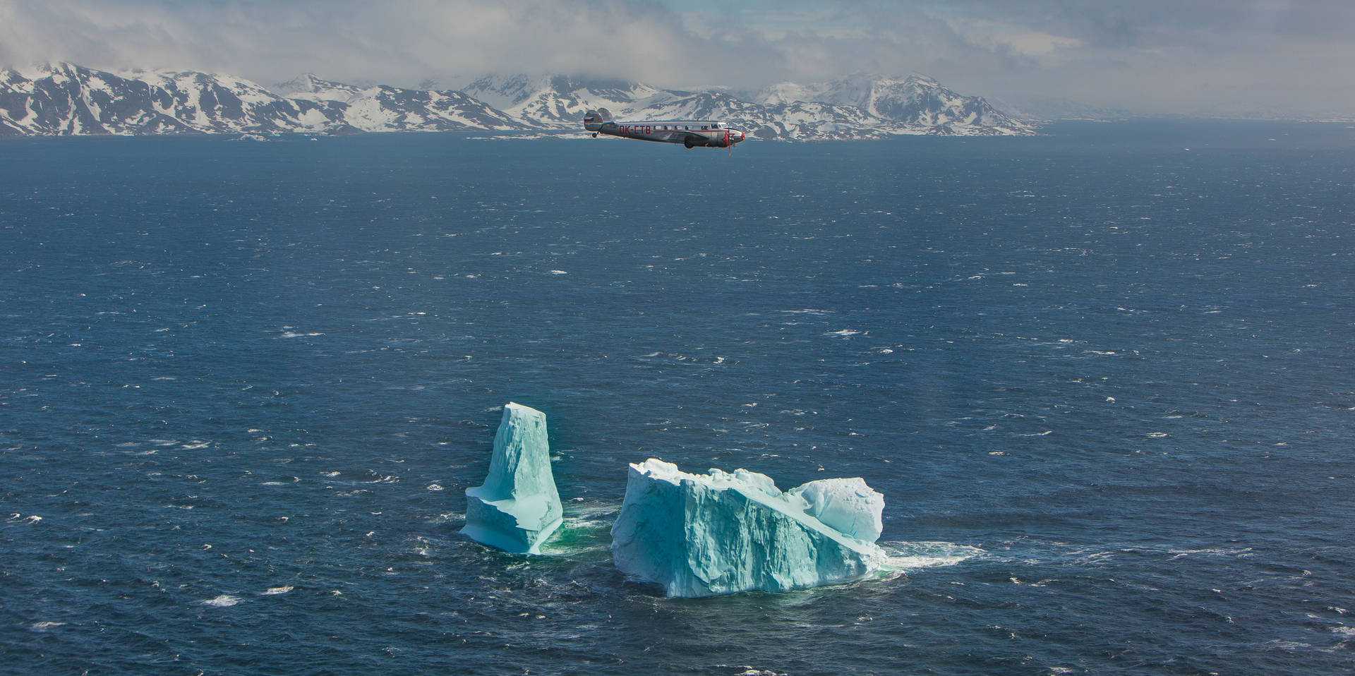 Greenland Lockheed Electra Flight Background