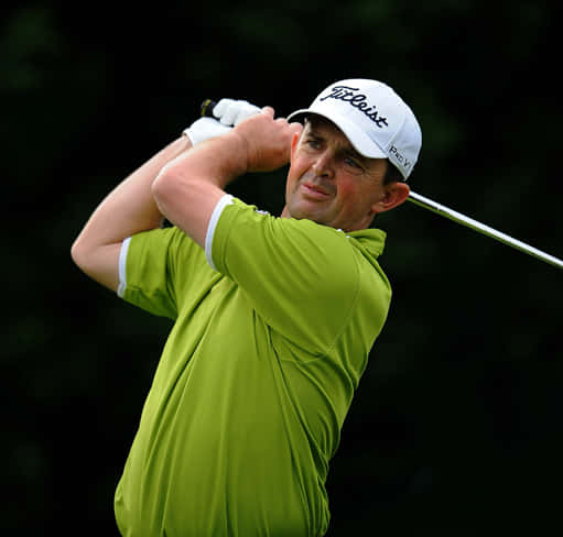 Greg Chalmers Sporting A Yellow-green Shirt At A Golf Tournament Background
