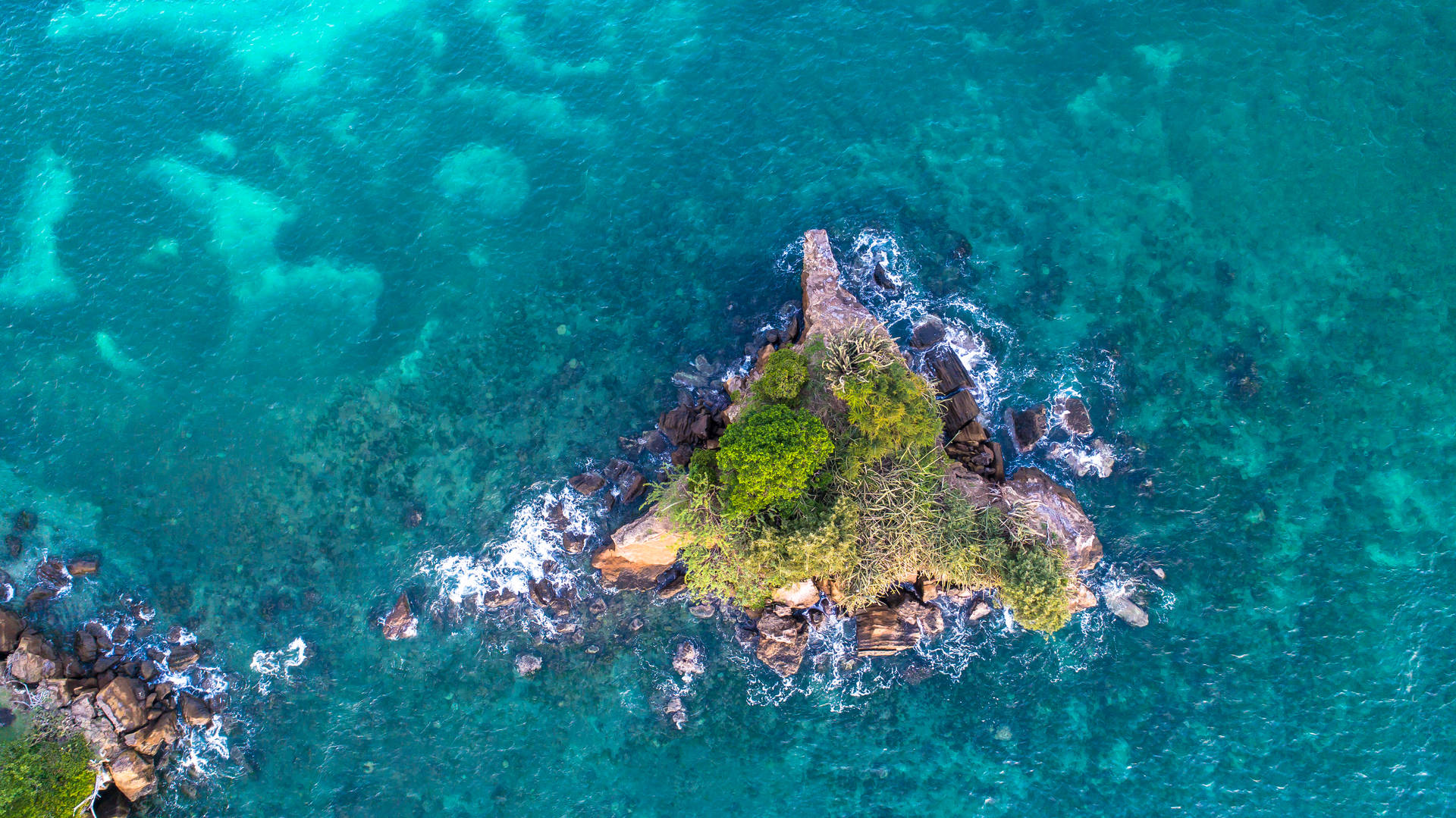 Grenada Ocean Rock Formations Background