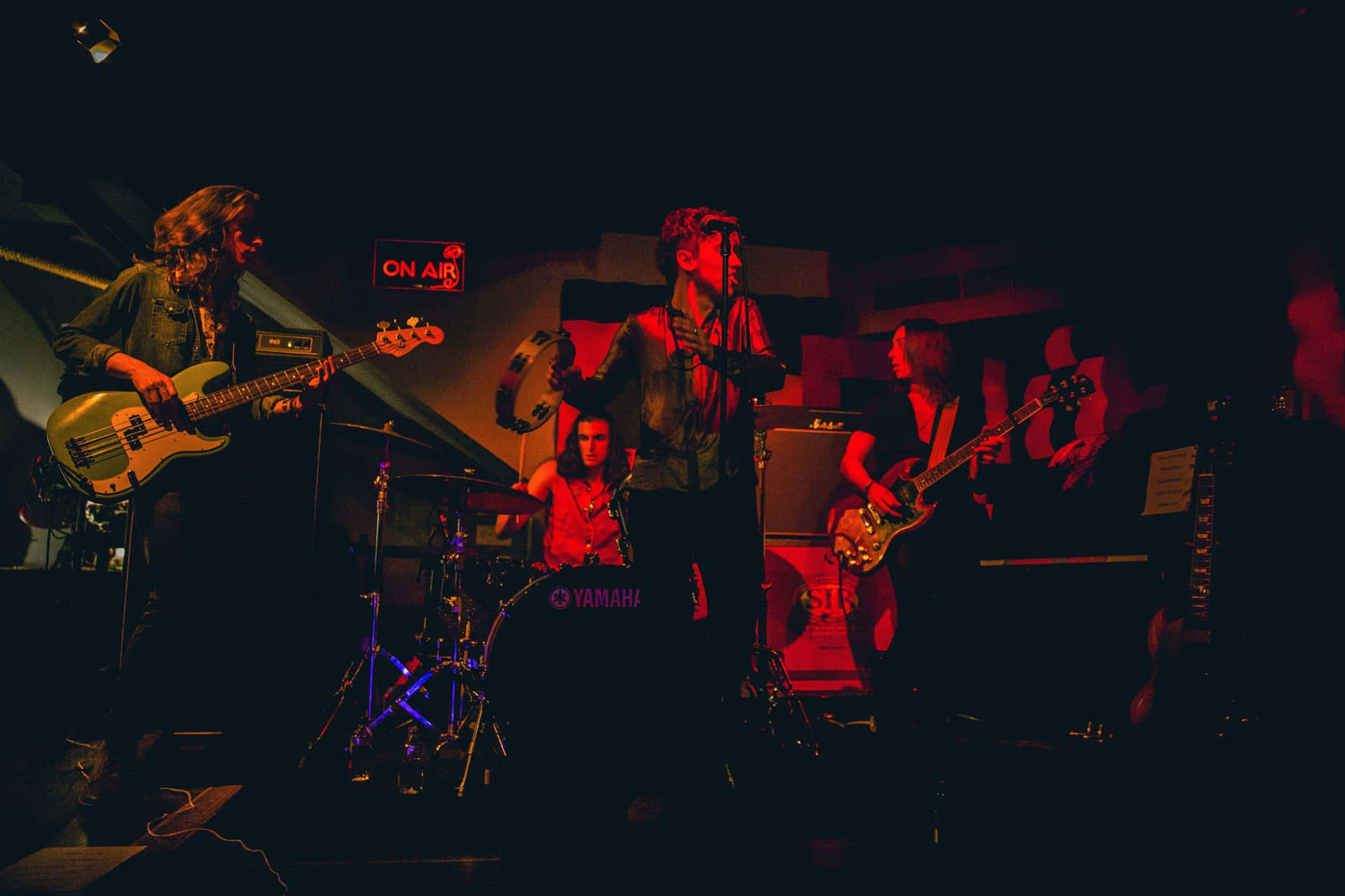 Greta Van Fleet Dark With Red Light Picture Background