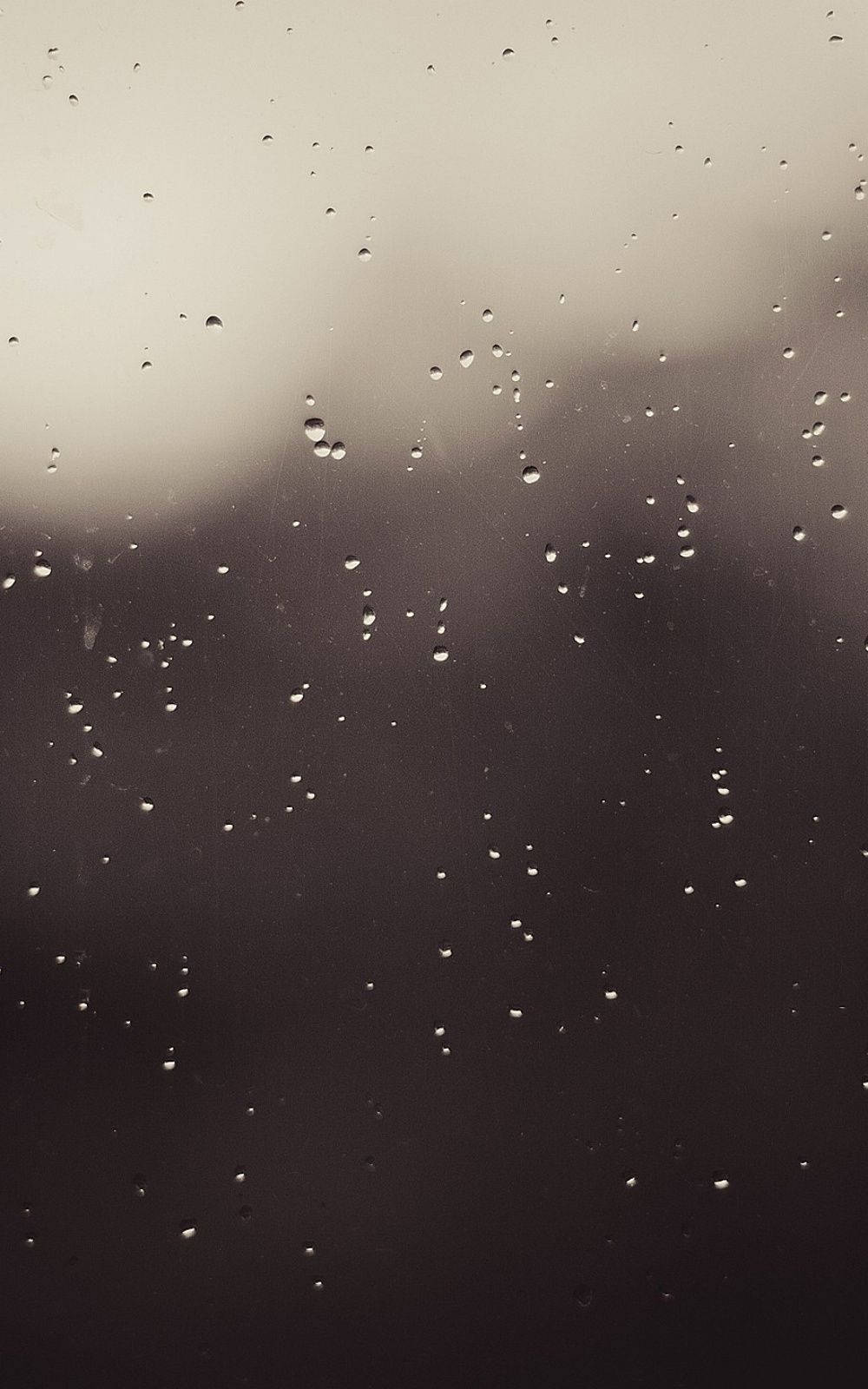 Grey Iphone Window With Rain Droplets Background