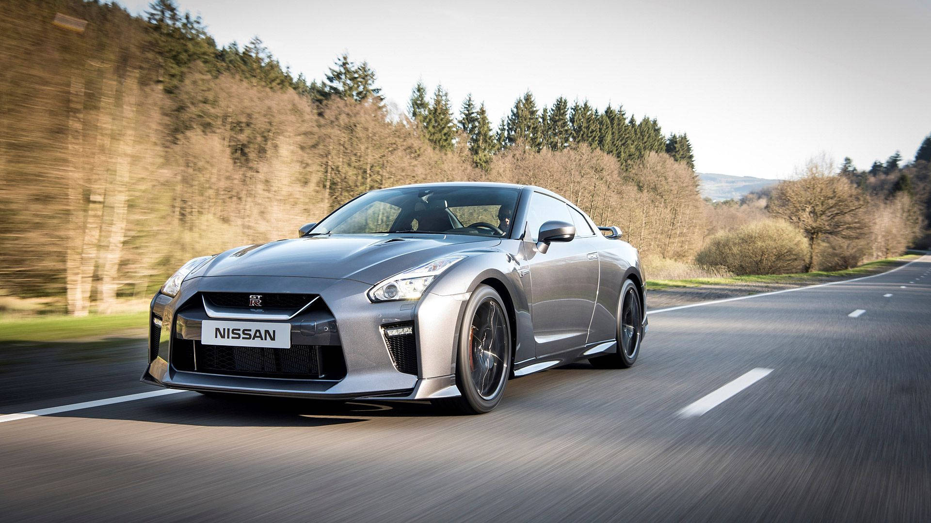 Grey Nissan Gtr On The Road Background