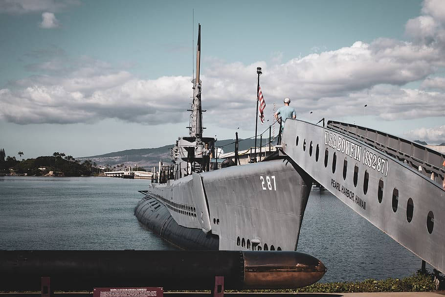 Grey Pearl Harbor Warship On Dock Background