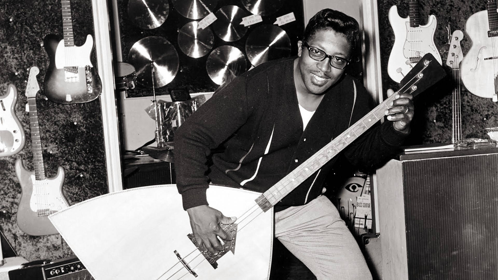 Greyscale Bo Diddley With Big Guitar Background