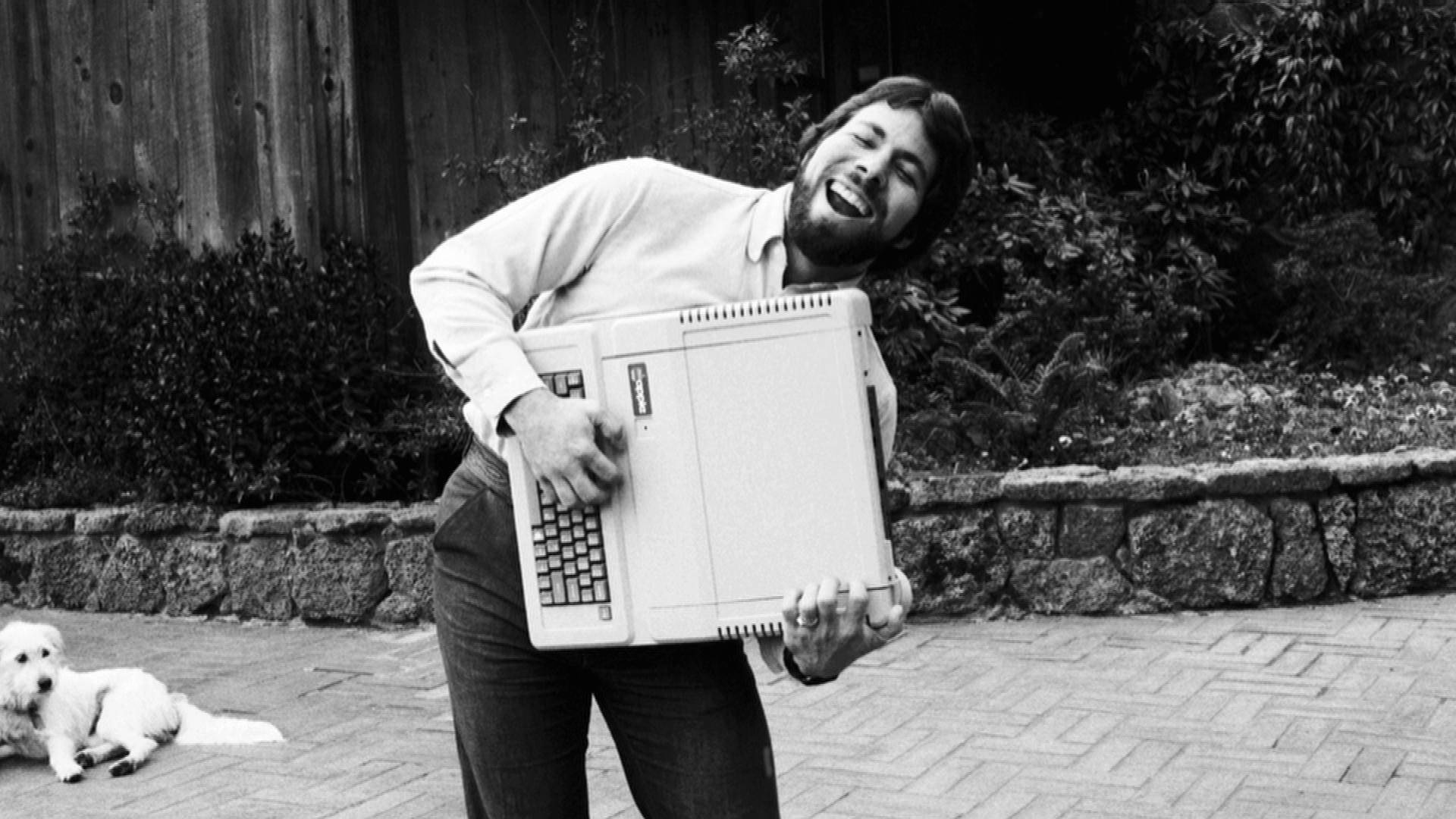 Greyscale Steve Wozniak Holding Apple Ii Background