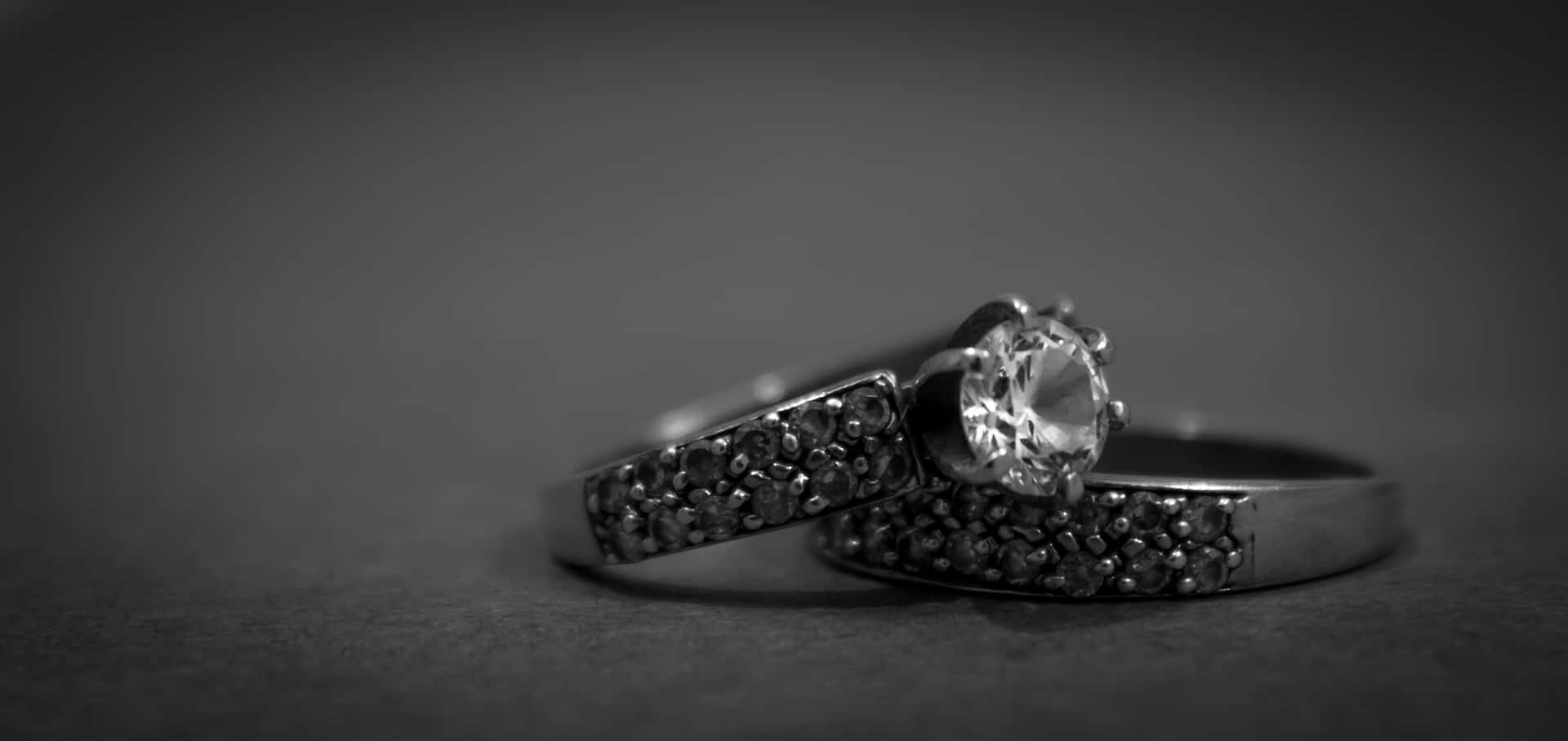 Greyscale Wedding Ring With Diamond Background