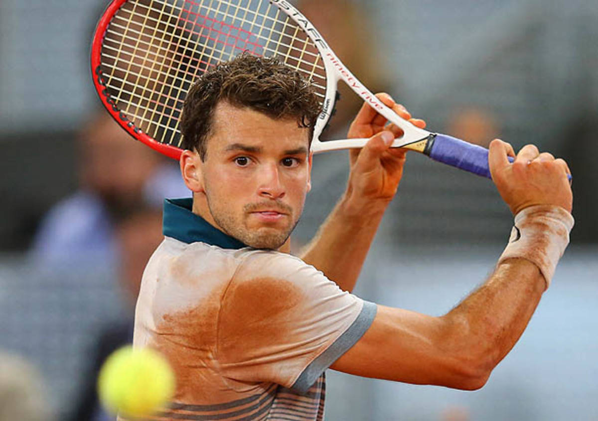 Grigor Dimitrov Aiming Tennis Racket Background