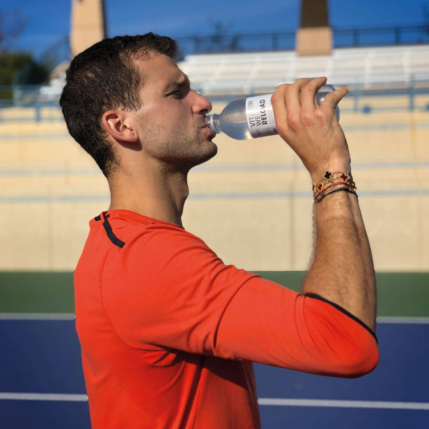 Grigor Dimitrov Drinking Water Background