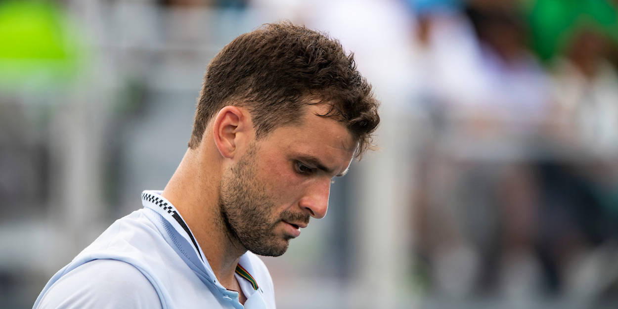 Grigor Dimitrov Looking Down Background