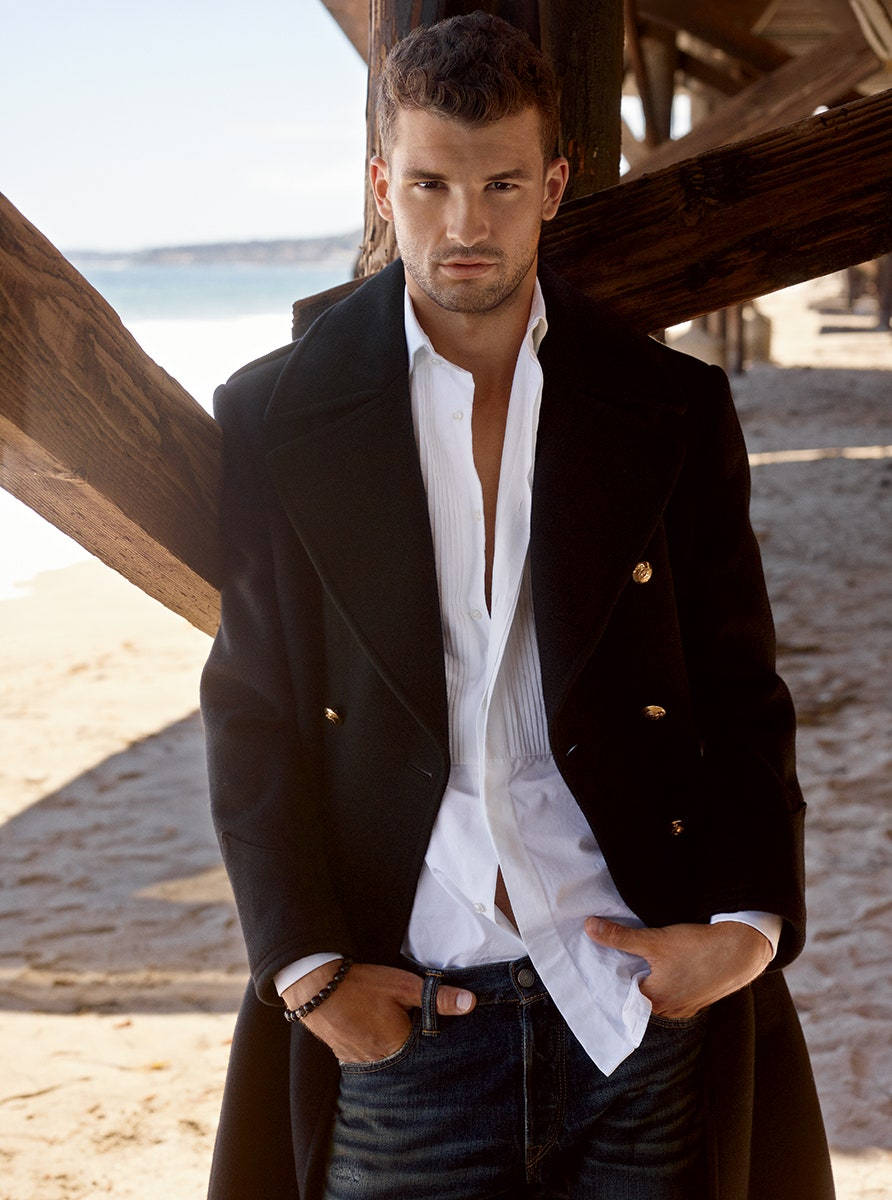 Grigor Dimitrov Posing In Black Coat Background