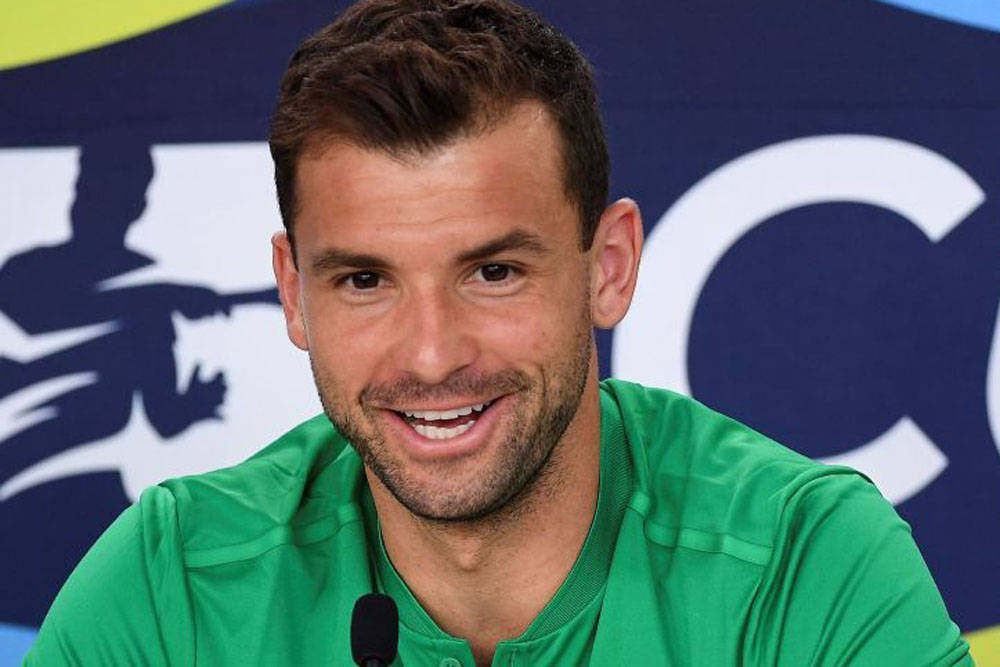 Grigor Dimitrov Smiling At Press Conference Background