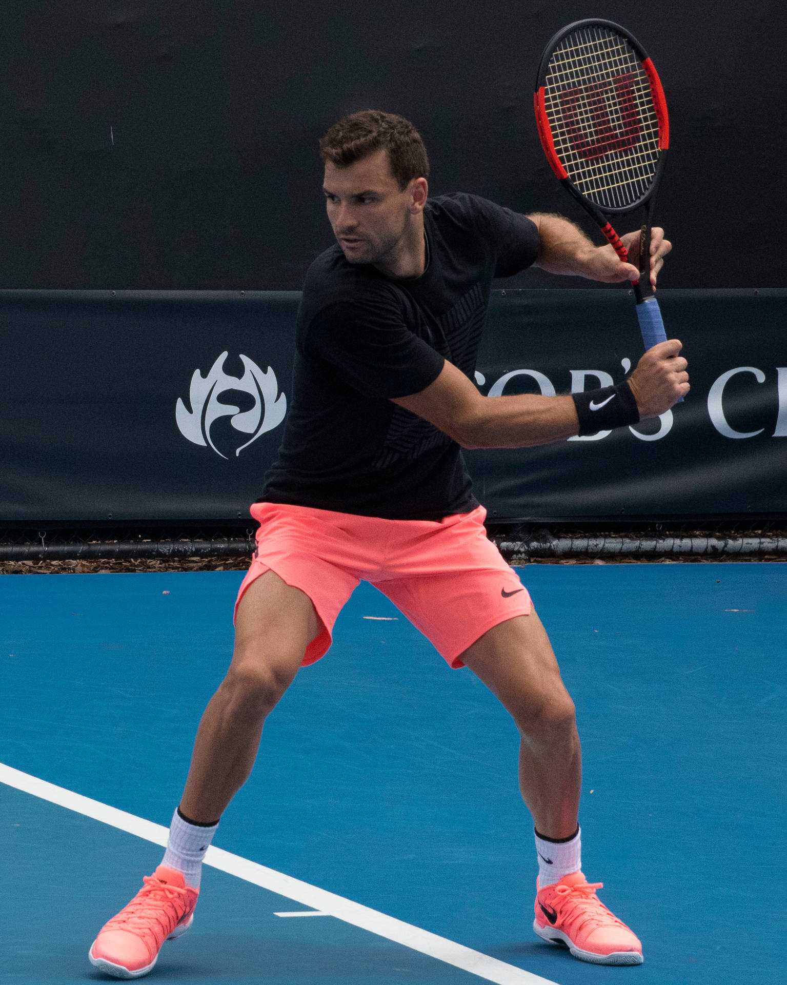 Grigor Dimitrov Wearing Neon Tennis Shorts Background